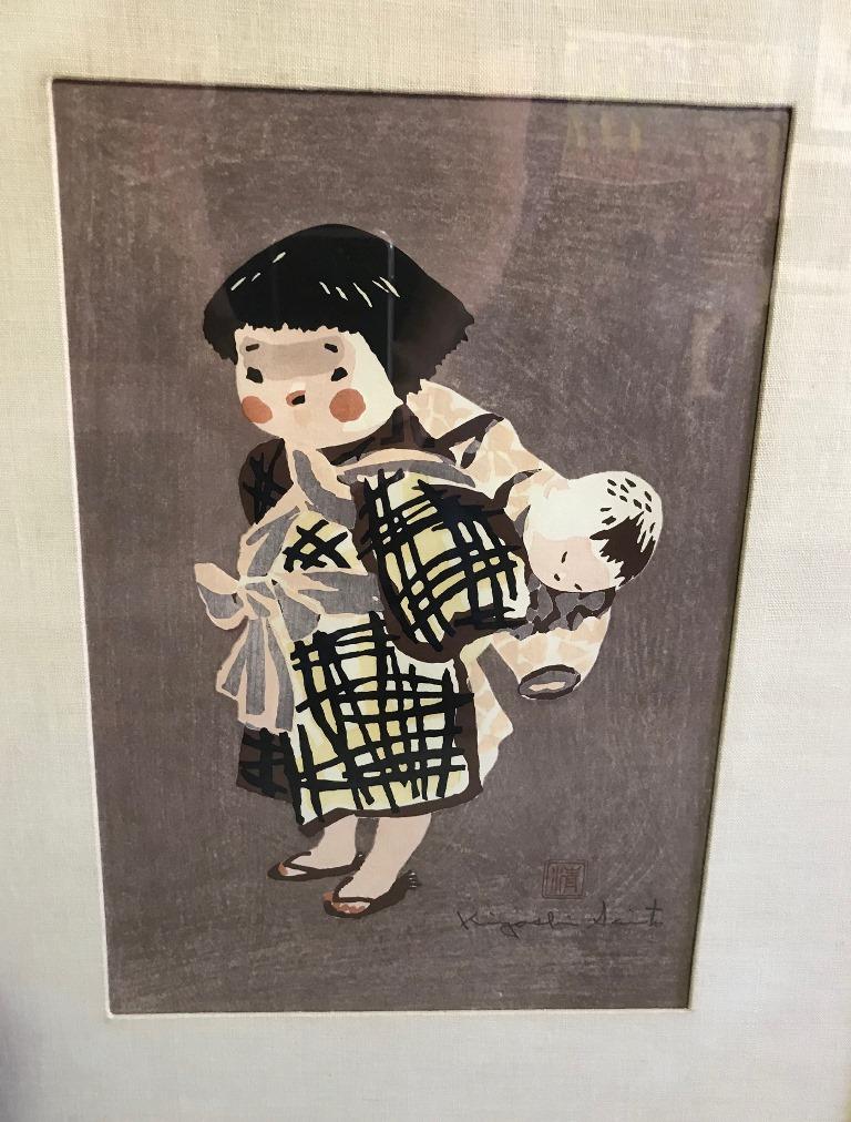 An early work by Japanese master print maker Kiyoshi Saito, this of a young girl carrying a baby on her back in Saito's home village of Aizu. Many consider Saito to be one of the most important, if not the most important, contemporary Japanese