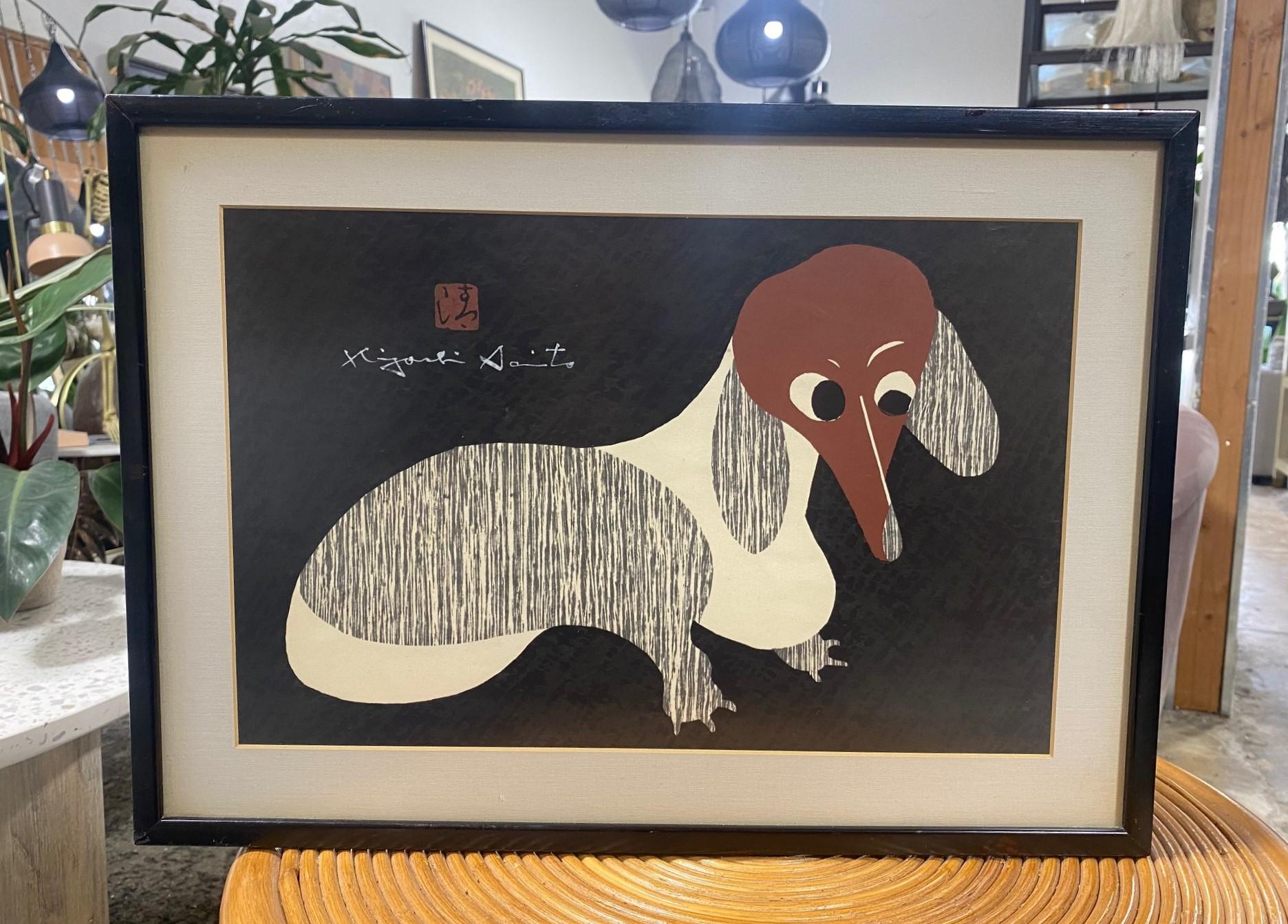 This beautifully and playfully composed woodblock print featuring a dachshund dog (also known as the wiener dog or sausage dog) is by famed Japanese master printmaker/artist Kiyoshi Saito. Many consider Saito to be one of the most important, if not