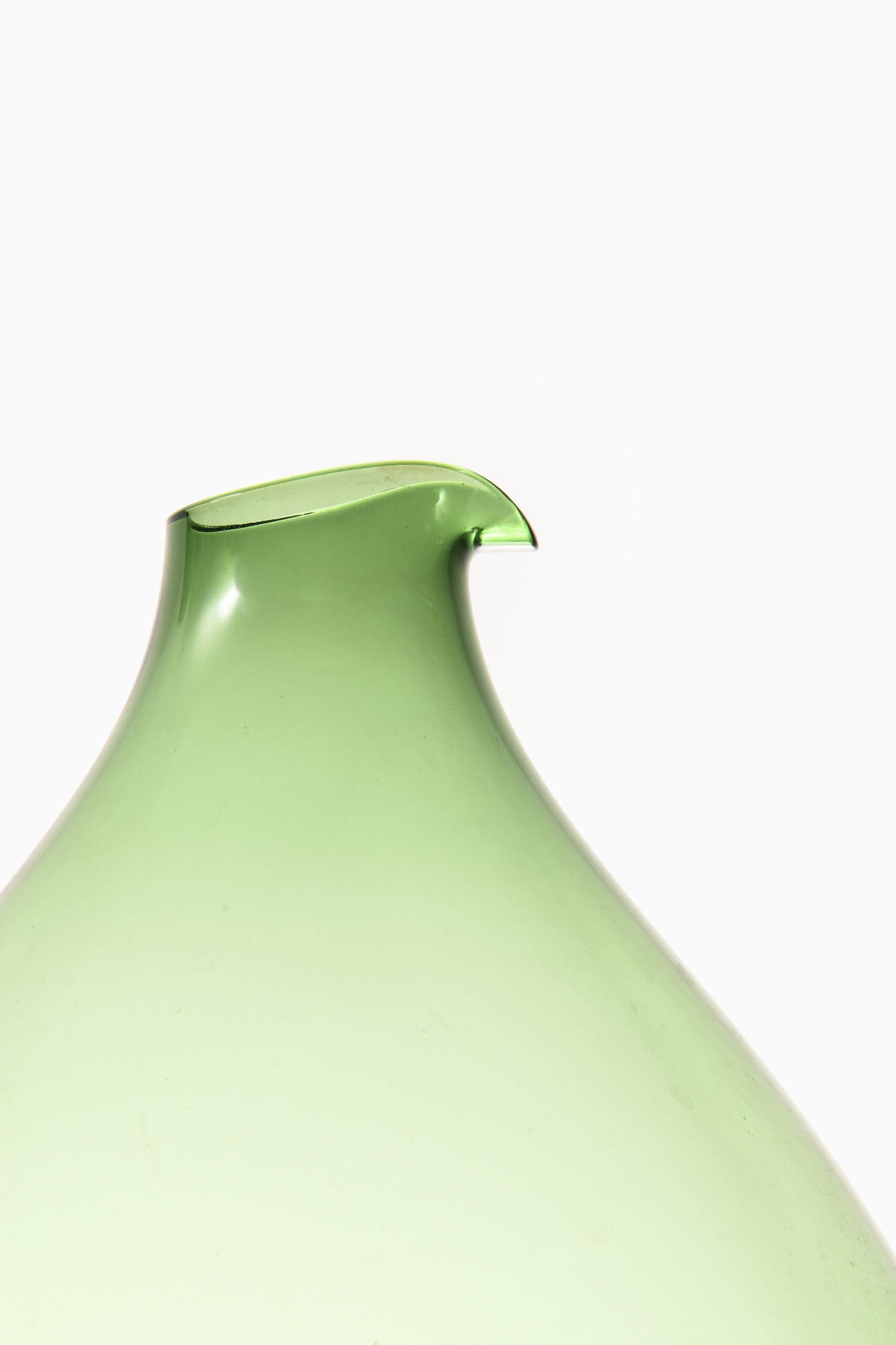 Rare and large glass vase designed by Kjell Blomberg. Produced by Gullaskruf in Sweden.
