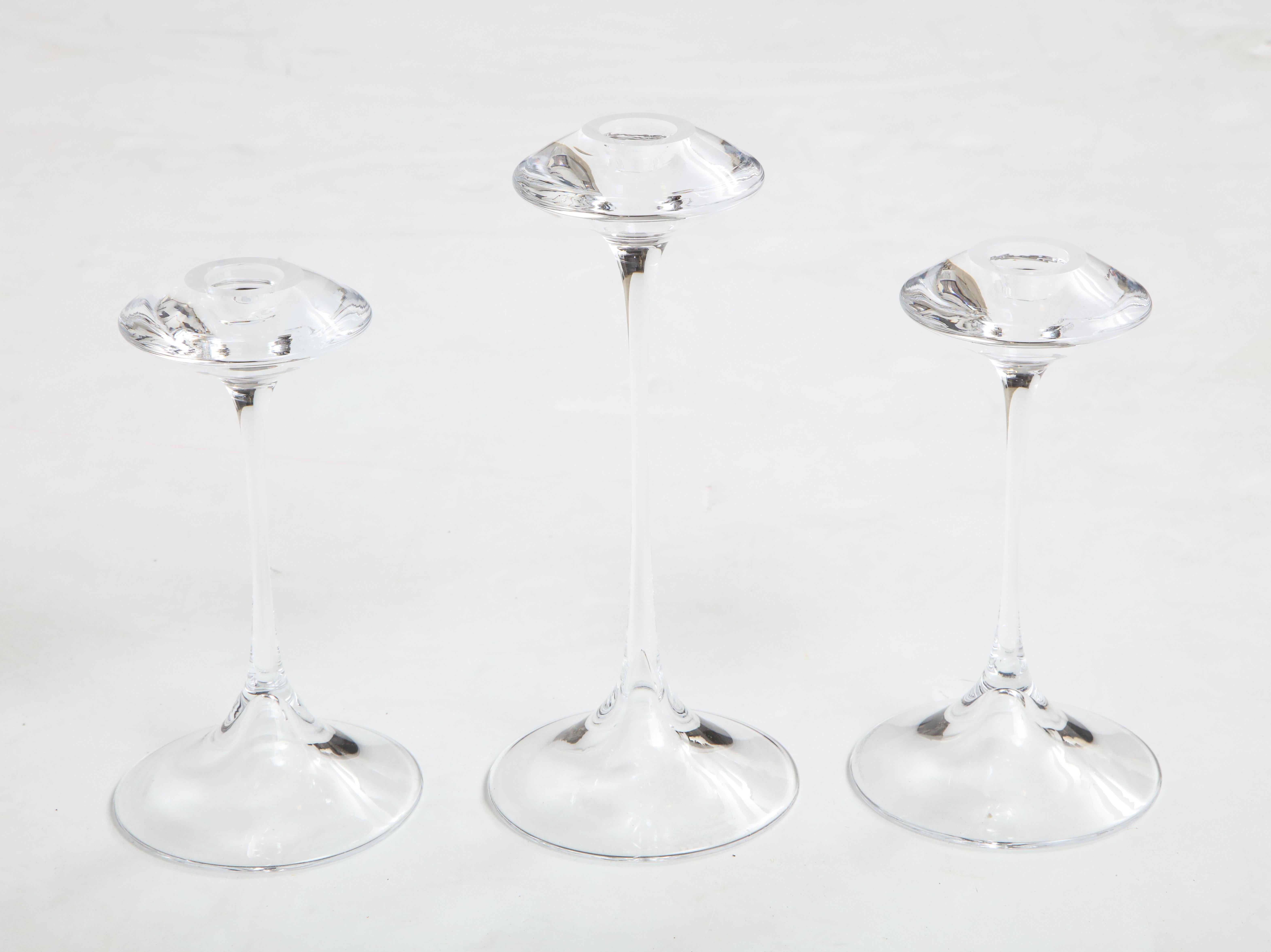 Stunning set of 3 Kjell Engman for Kosta Boda glass candlesticks.

The two smaller candlesticks height is 7''.