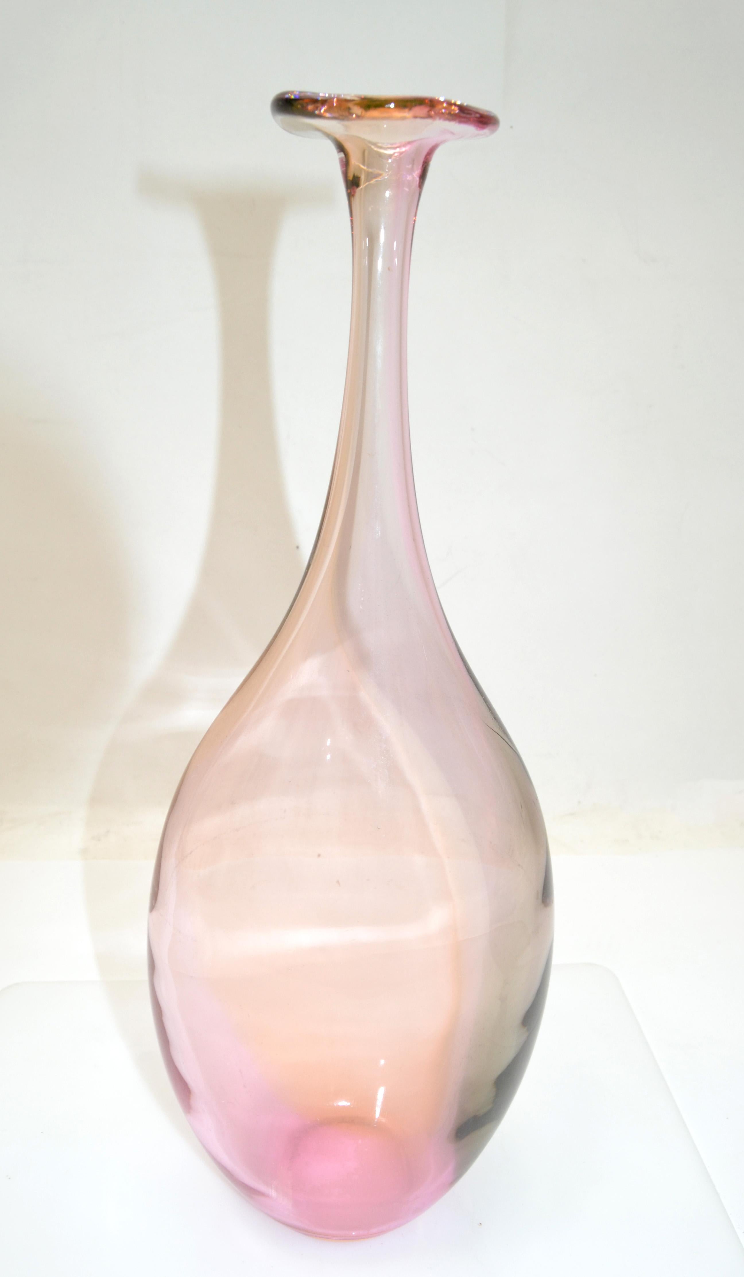 Fidji Collection Mid-Century Modern long neck bottle, art glass weed vase designed by Kjell Engman for Kosta Boda made in Sweden.
Lead-free crystal in the colors inspired by a rainbow reflection of oil spilled on water.
Engraved at the bottom and