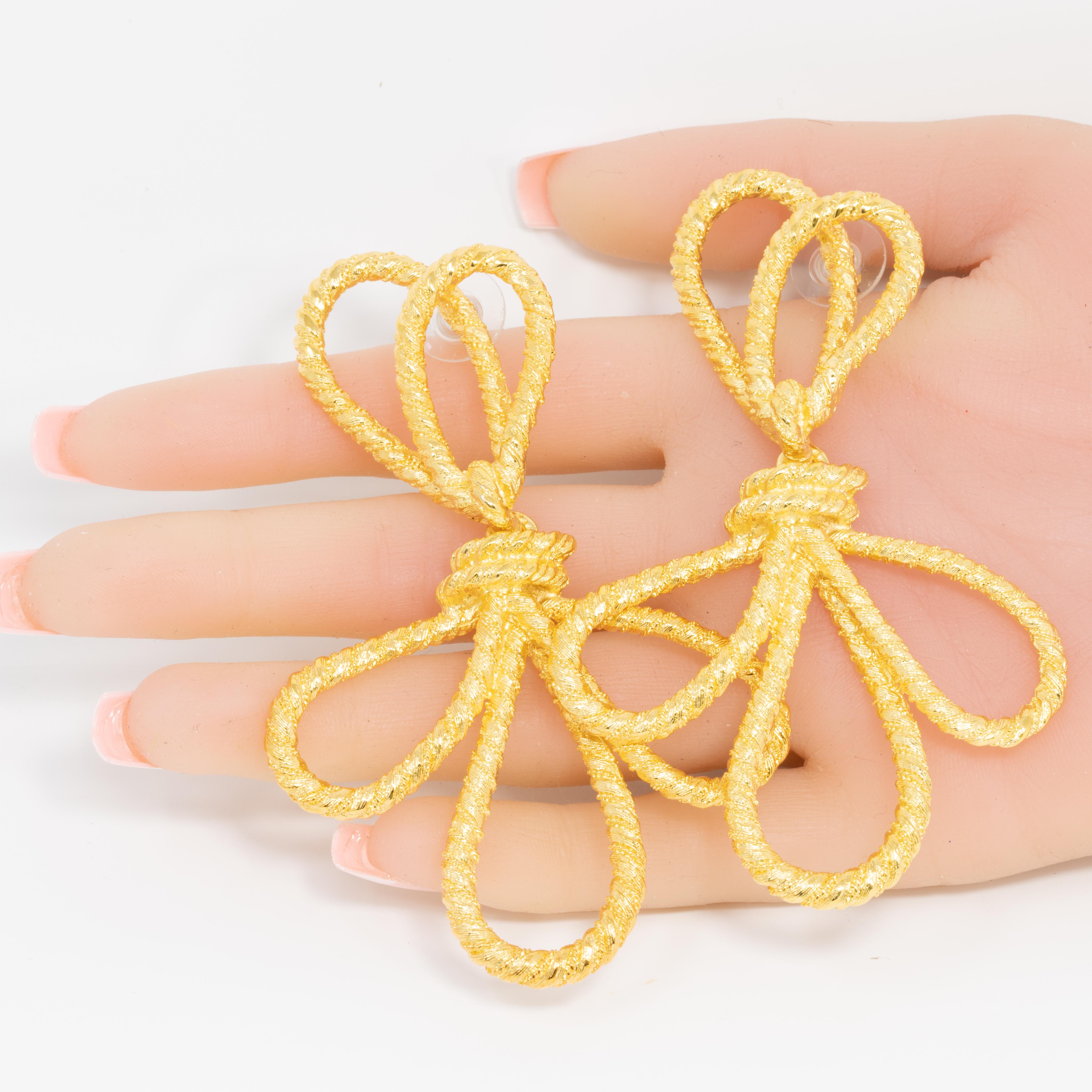 gold bow earrings dangle