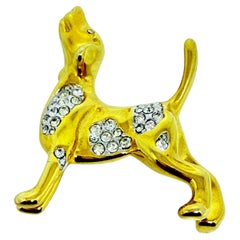 KJL KENNETH JAY LANE broche de diseño con figura de perro con brillantitos firmado en tono dorado