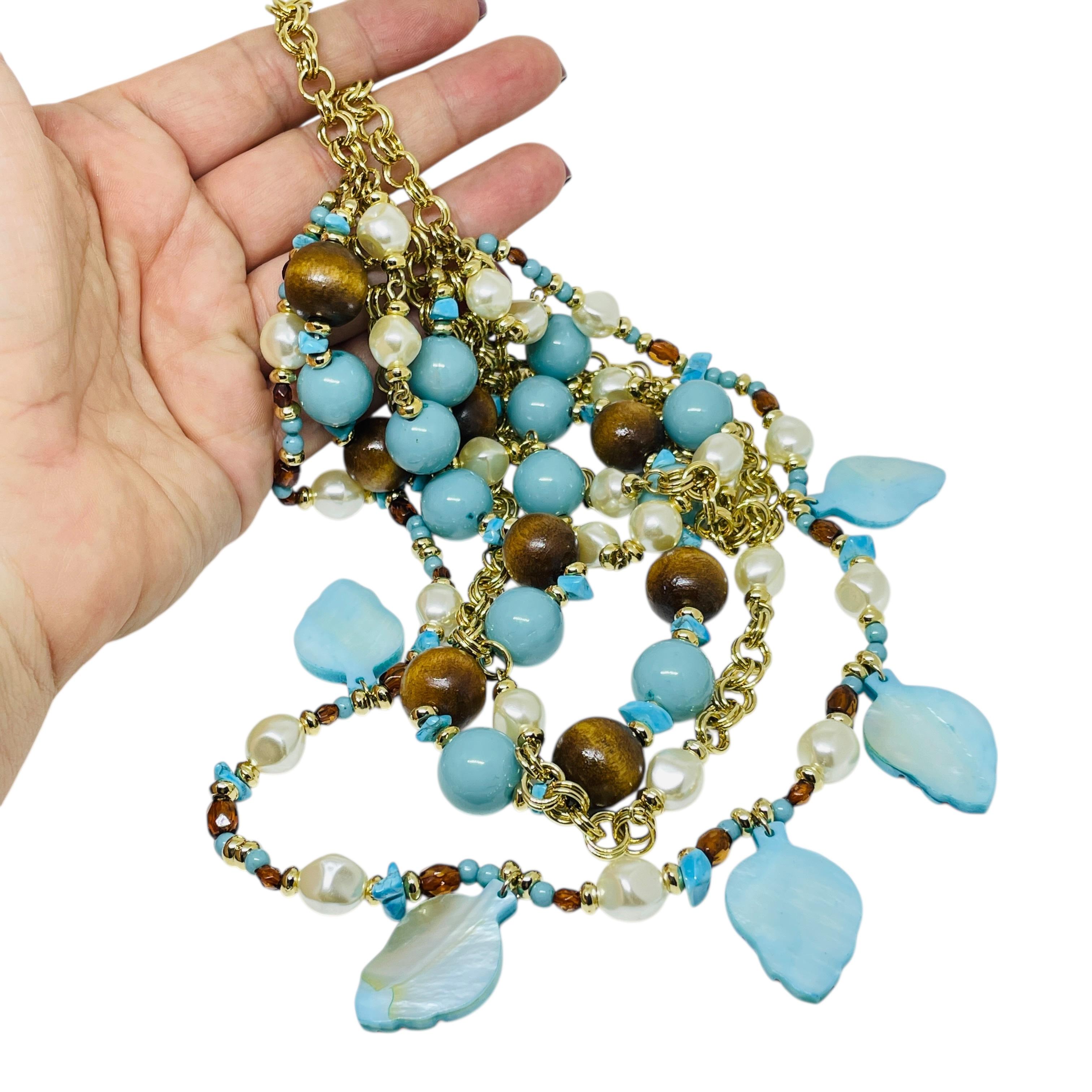 DETAILS

- • unterzeichnet KJL KENNETH JAY LANE

- • goldfarben mit Harzperlen

- • Vintage-Designer-Halskette
 
MASSNAHMEN  

- • CONDIT

- •  sehr guter Vintage-Zustand mit minimalen Gebrauchsspuren 

 Sku 56

❤️❤️   VINTAGE-DESIGNER-SCHMUCK  