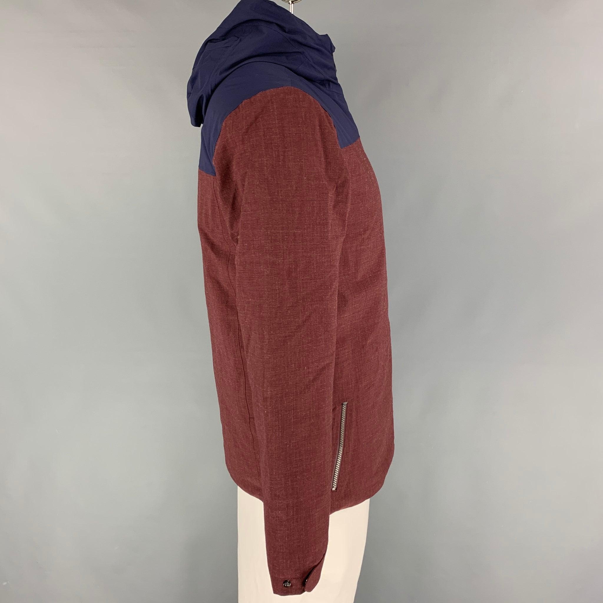 KJUS 'Zermatt' jacket comes in a burgundy & navy color block polyester / wool featuring a hooded style, waterproof, zipper pockets, sleeve logo detail, and a full zip up closure.
New With Tags.
 

Marked:   50/M 

Measurements: 
 
Shoulder: 19.5