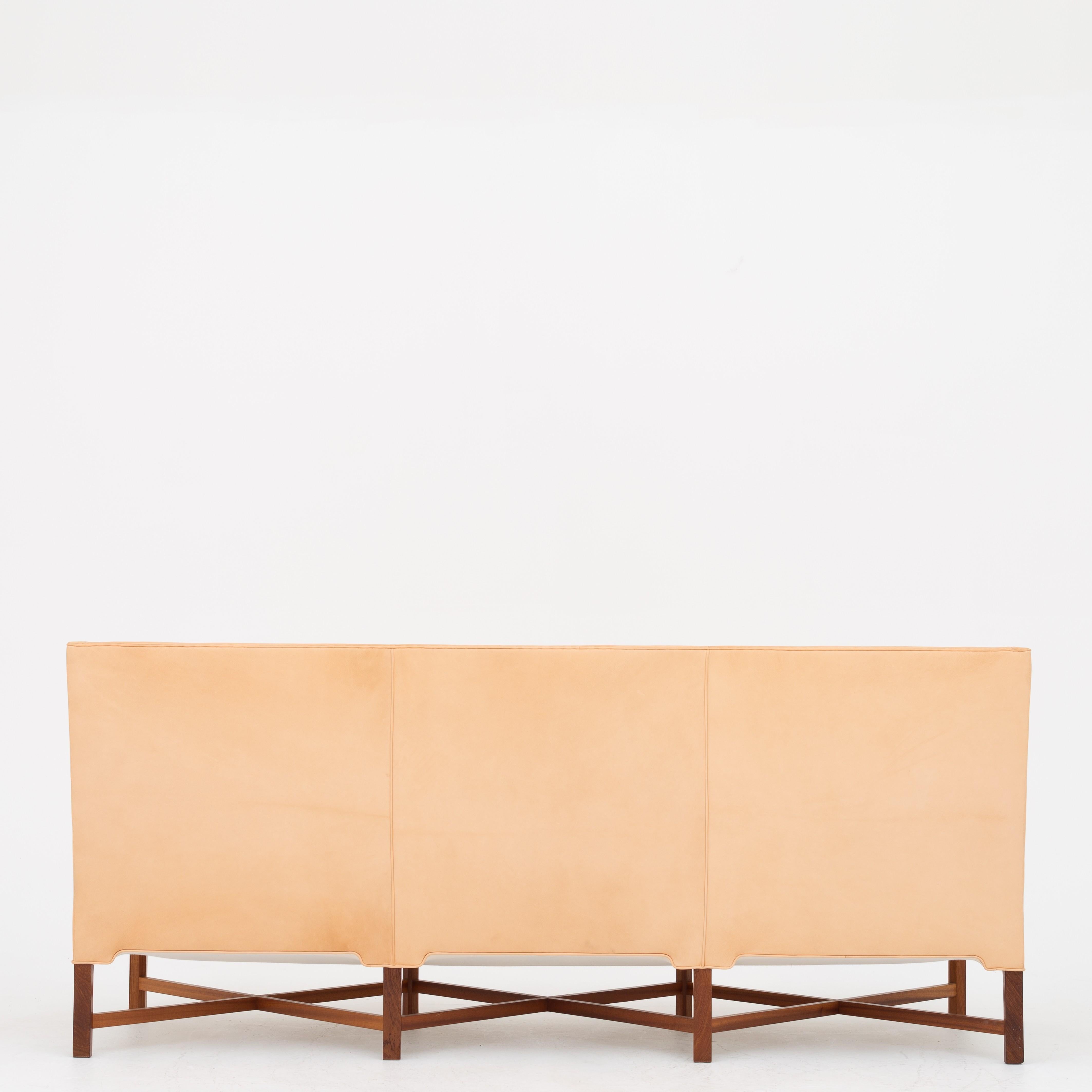 KK 4118, 3-seat sofa with solid mahogany crossed legs and new niger leather. Designed in 1929. Maker Rud. Rasmussen.