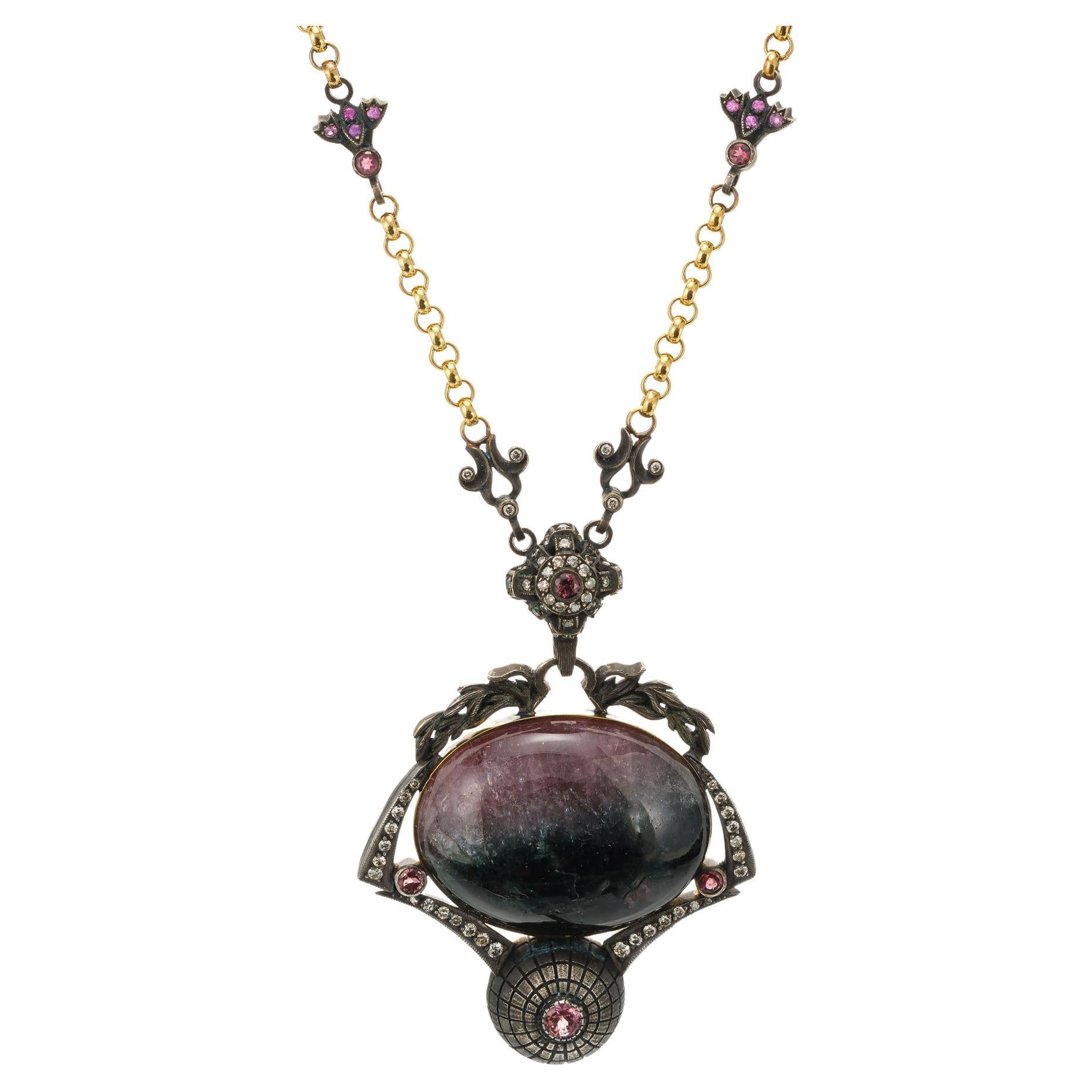 KK Wearable Art Sculpture Byzantine style double sided pendant necklace. Pink, black and white 35.00ct tourmaline accented with 14 pink tourmalines and 65 round diamonds. 18k yellow gold and blackened Sterling silver. Roman Chariot on reverse side