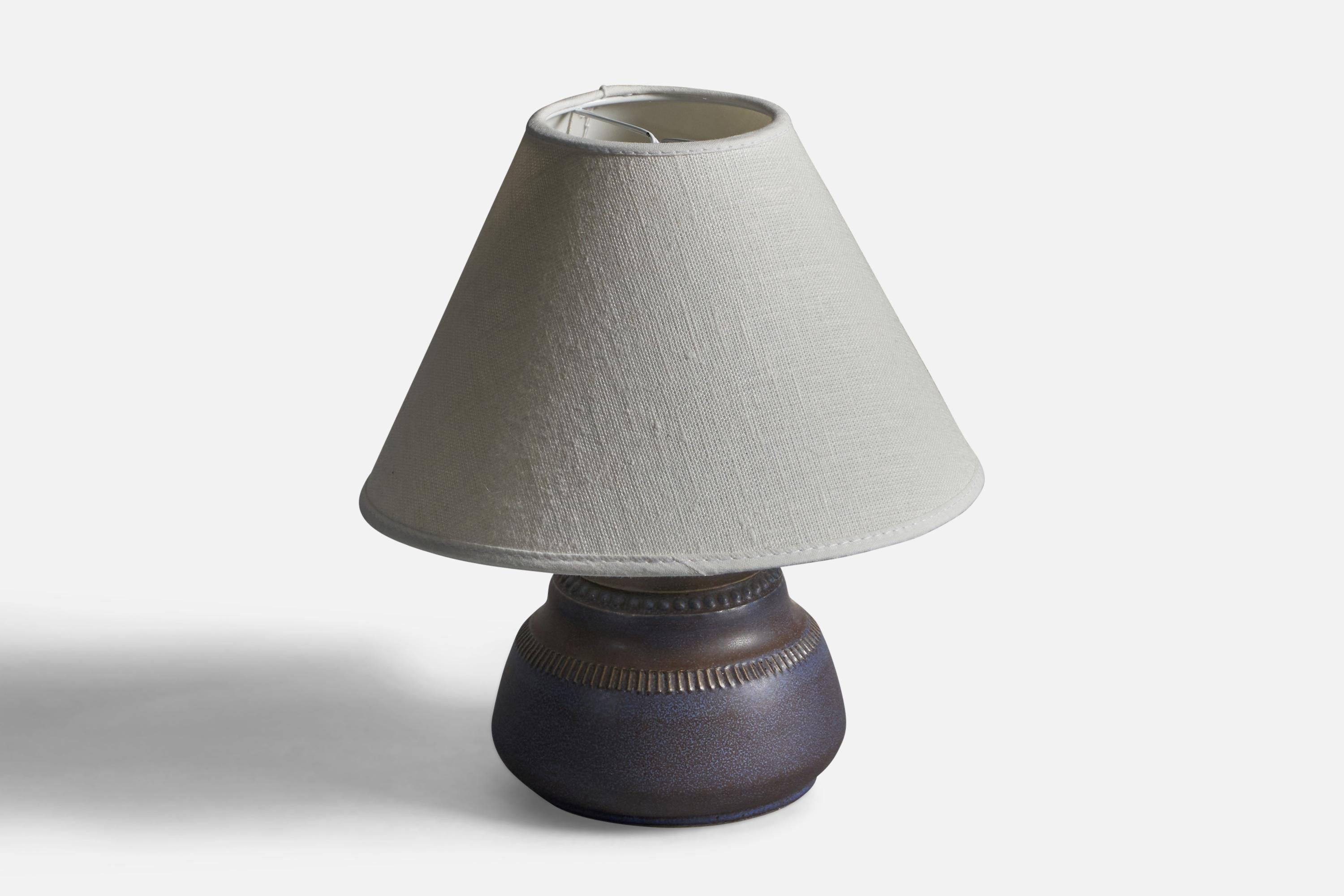 A blue-glazed stoneware table lamp designed and produced by Klase Höganäs, 1960s.

Dimensions of Lamp (inches): 6.5