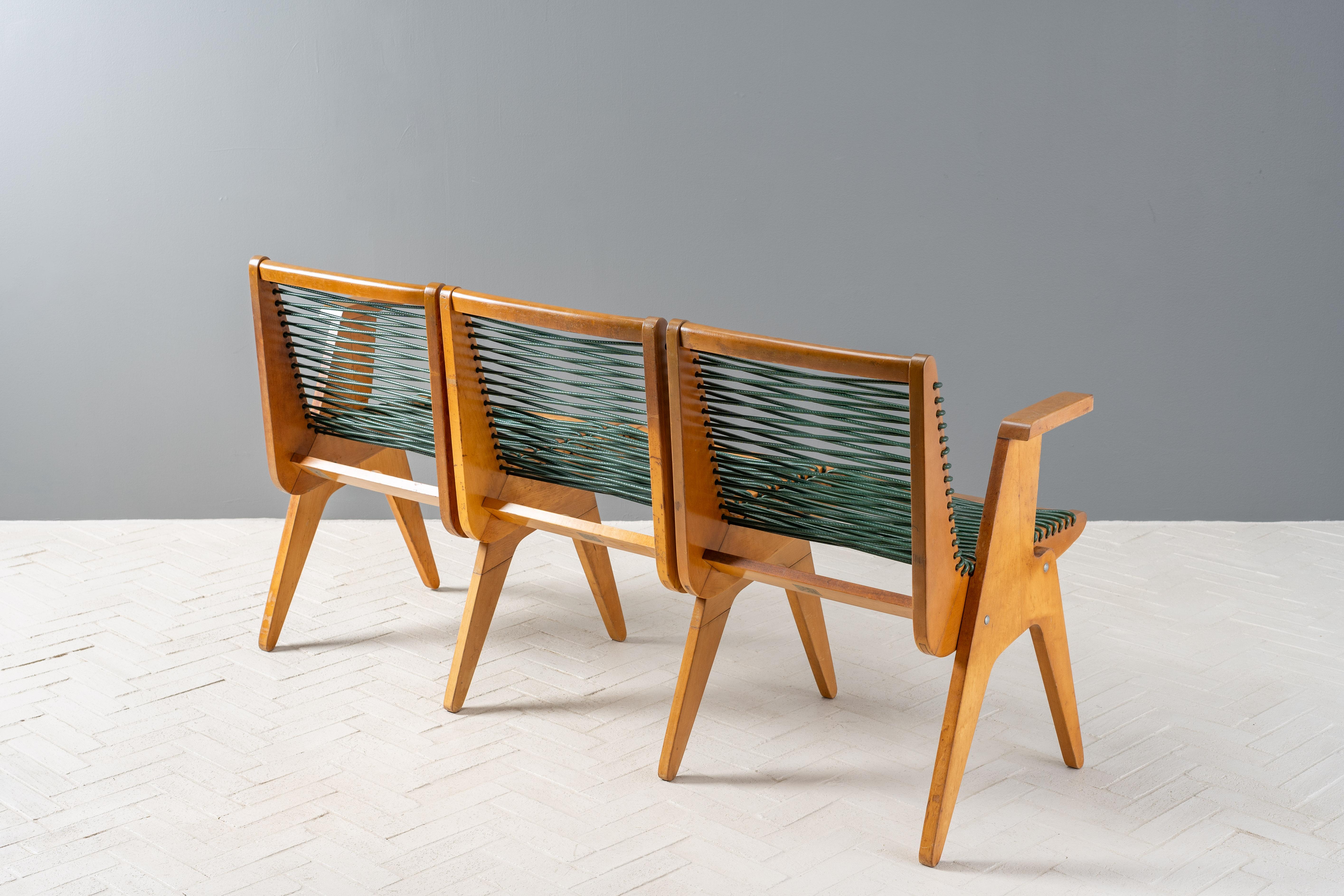 USA, ca. 1950s. An unusual 3-seat bench attributed to Klaus Grabe for Robert Kayton Associates - produced by the Kingston Manufacturing Company of Kingston, NY. Featuring an angular modular design executed in solid birch with tapered legs and