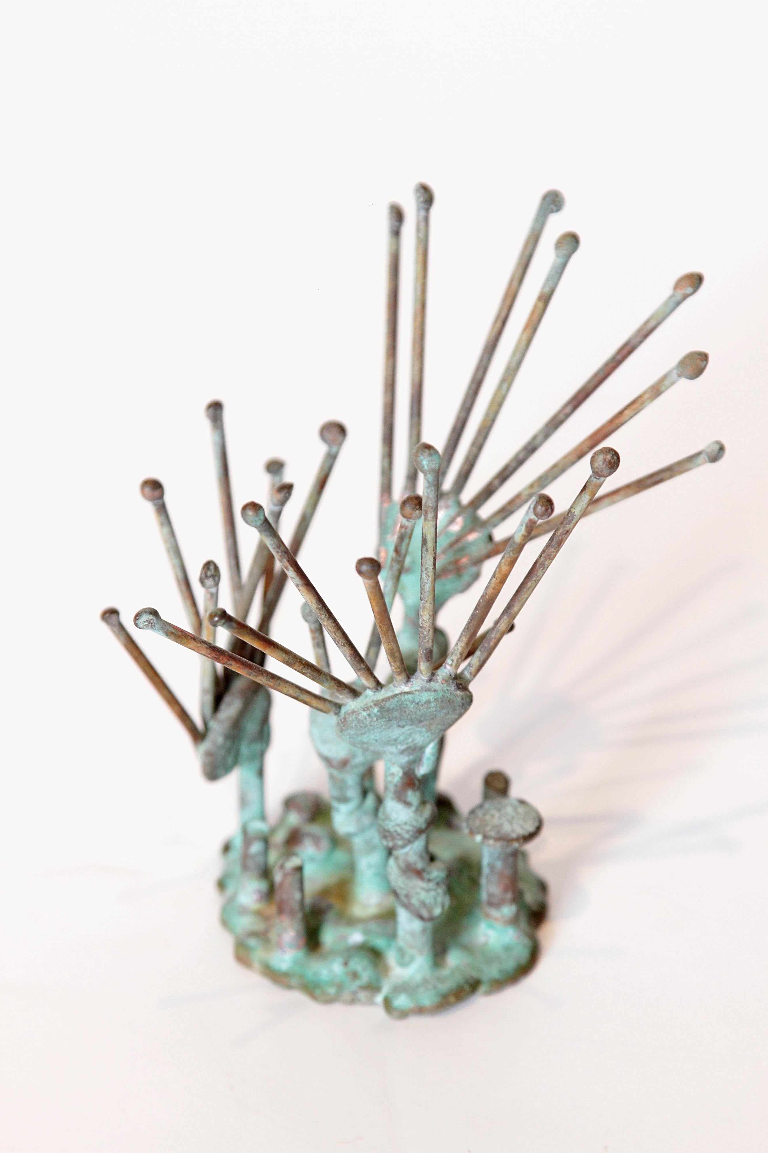 A patinated bronze sculpture by German/American Klaus Ihlenfeld, b. 1934. The sculpture is initialed K. and depicts vegetation from the sea floor. Klaus Ihlenfeld worked as a studio assistant to Harry Bertoia and went on the create pieces