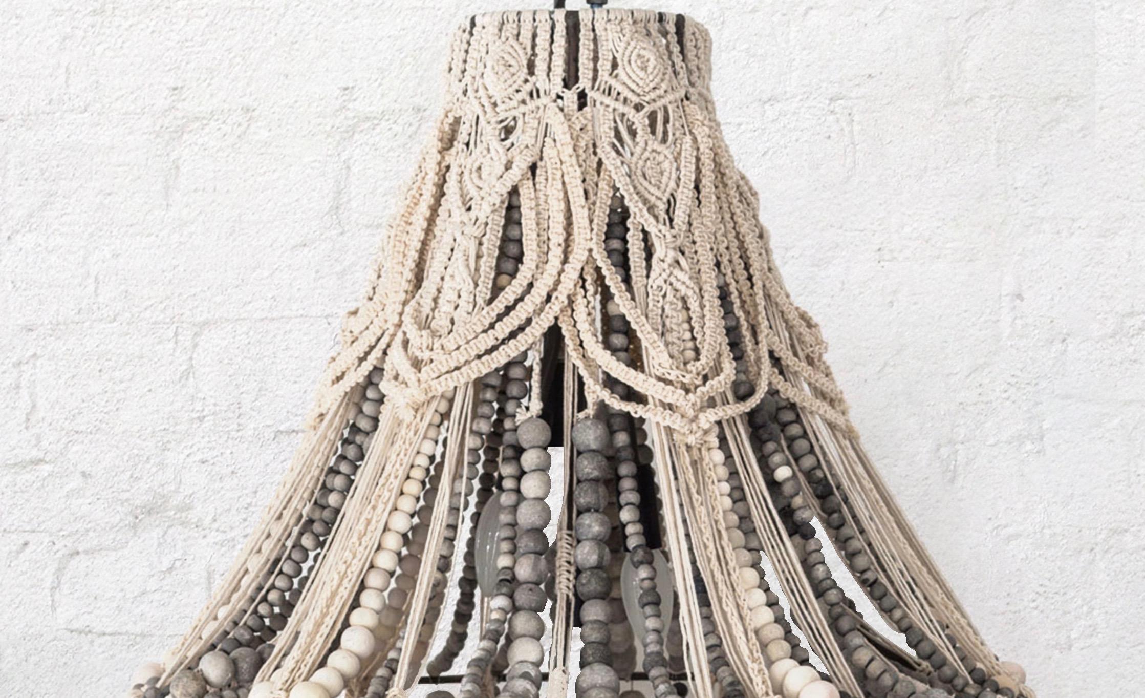 This one of a kind, utterly unique and magnificent macramé clay bead chandelier is collaboration between klaylife and Australian artisan Elena from three Queens Interiors.

Elena’s signature, intricate and creamy macramé work has been interwoven