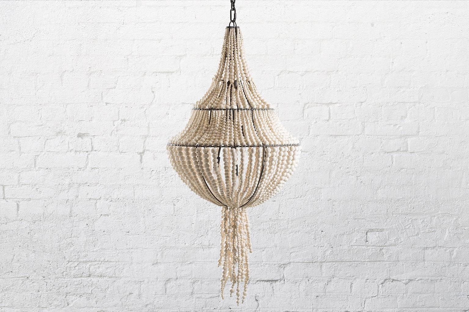 A three-tiered, modern chandelier with an optional swishy tail.

The Swish is our new clay beaded pendant and is like jewelry for your home! A unique take on a chandelier and standout in any room, she is sure to start a conversation.

Available
