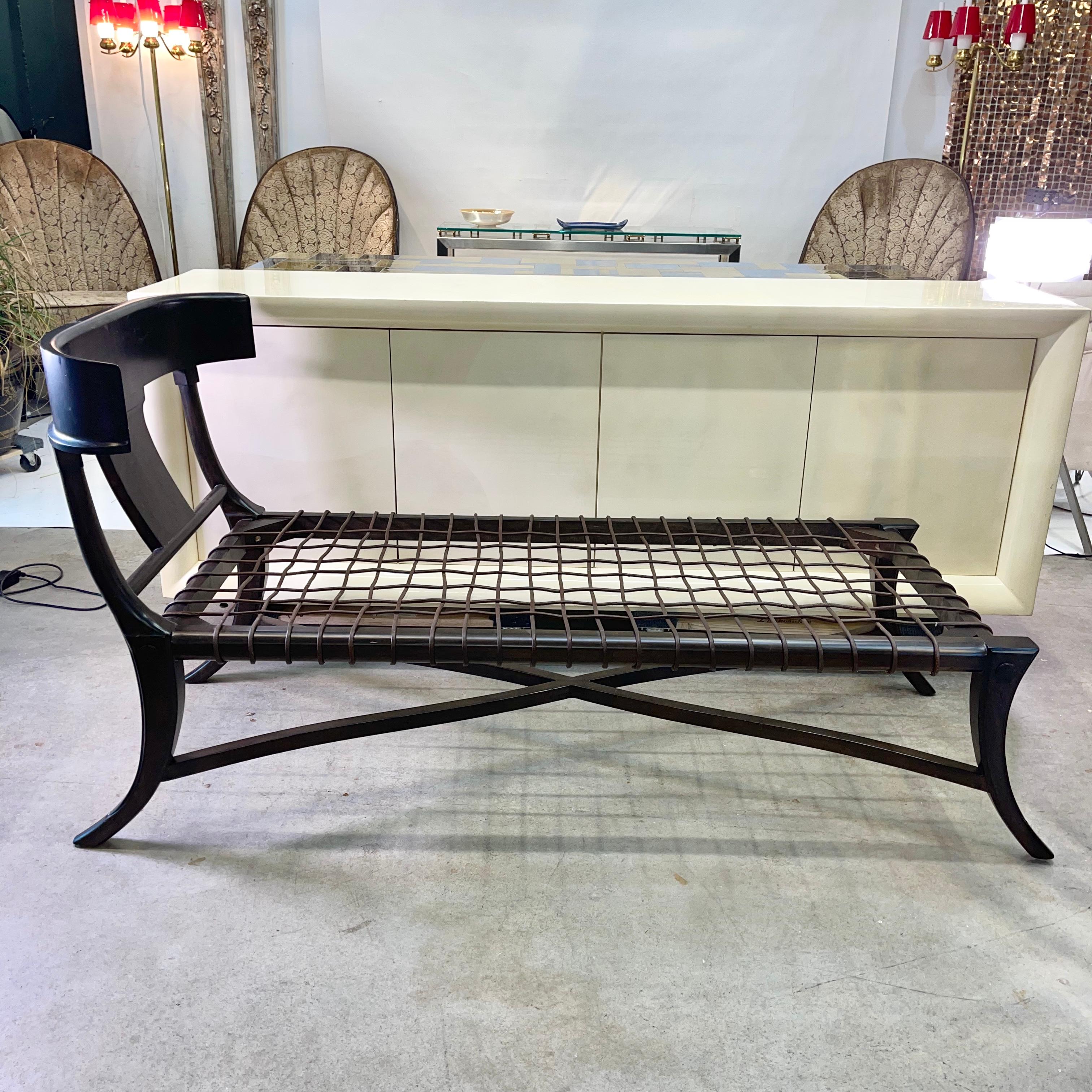 ***SUMMER SALE***
reduced from $2800


Dark chocolate stained ash frame with leather strapping. The chaise lounge features a graceful curving back and saber curved legs.

36.5” high
32” wide
72” long
18” seat height

Cushions not included.

Inspired