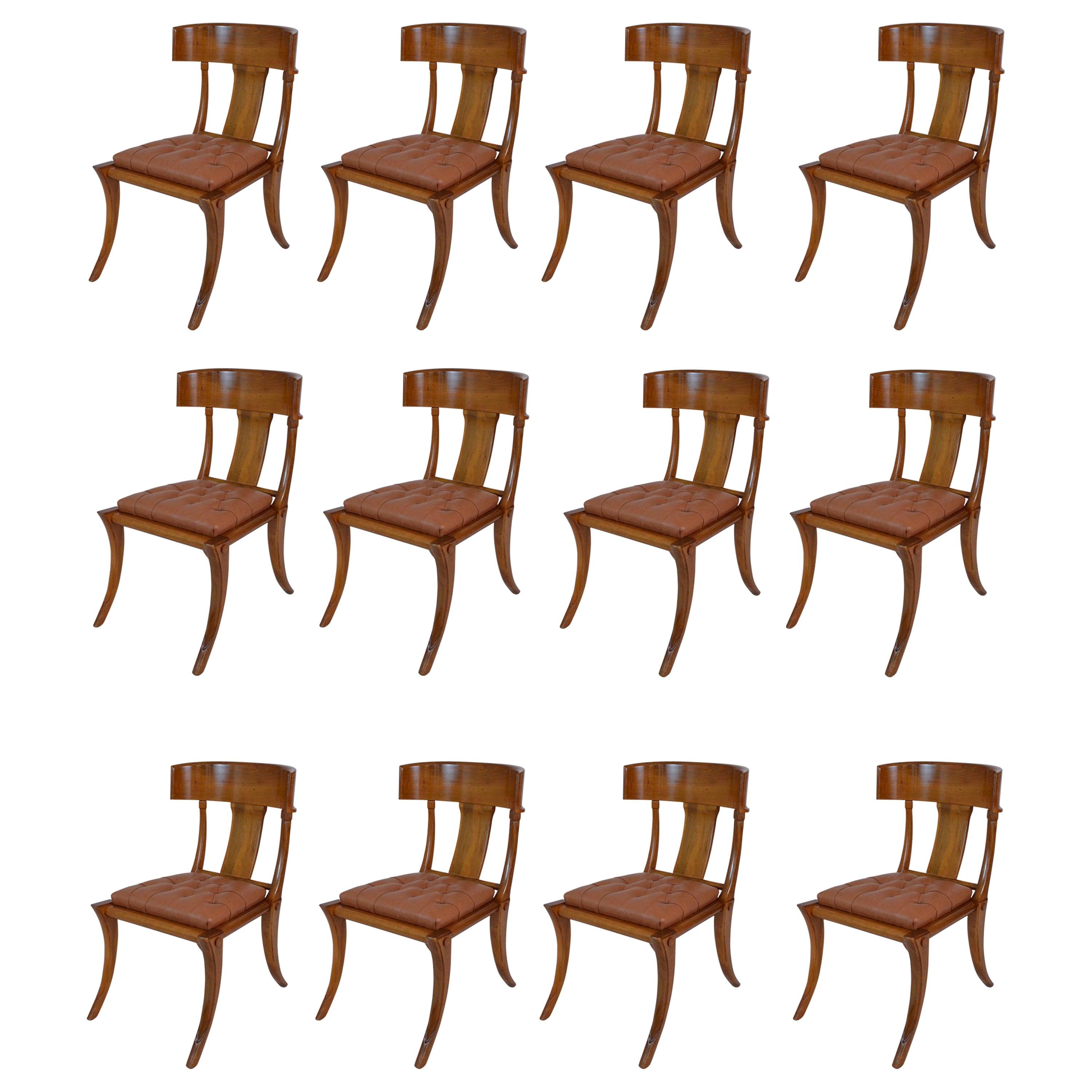 Klismos customizable chairs with saber legs, natural wood shiny finishing and leather seats with buttons. Available in other colors and upholstery.

Walnut wood chairs with deep and large seat and back wraparound feeling backrest. These chairs are