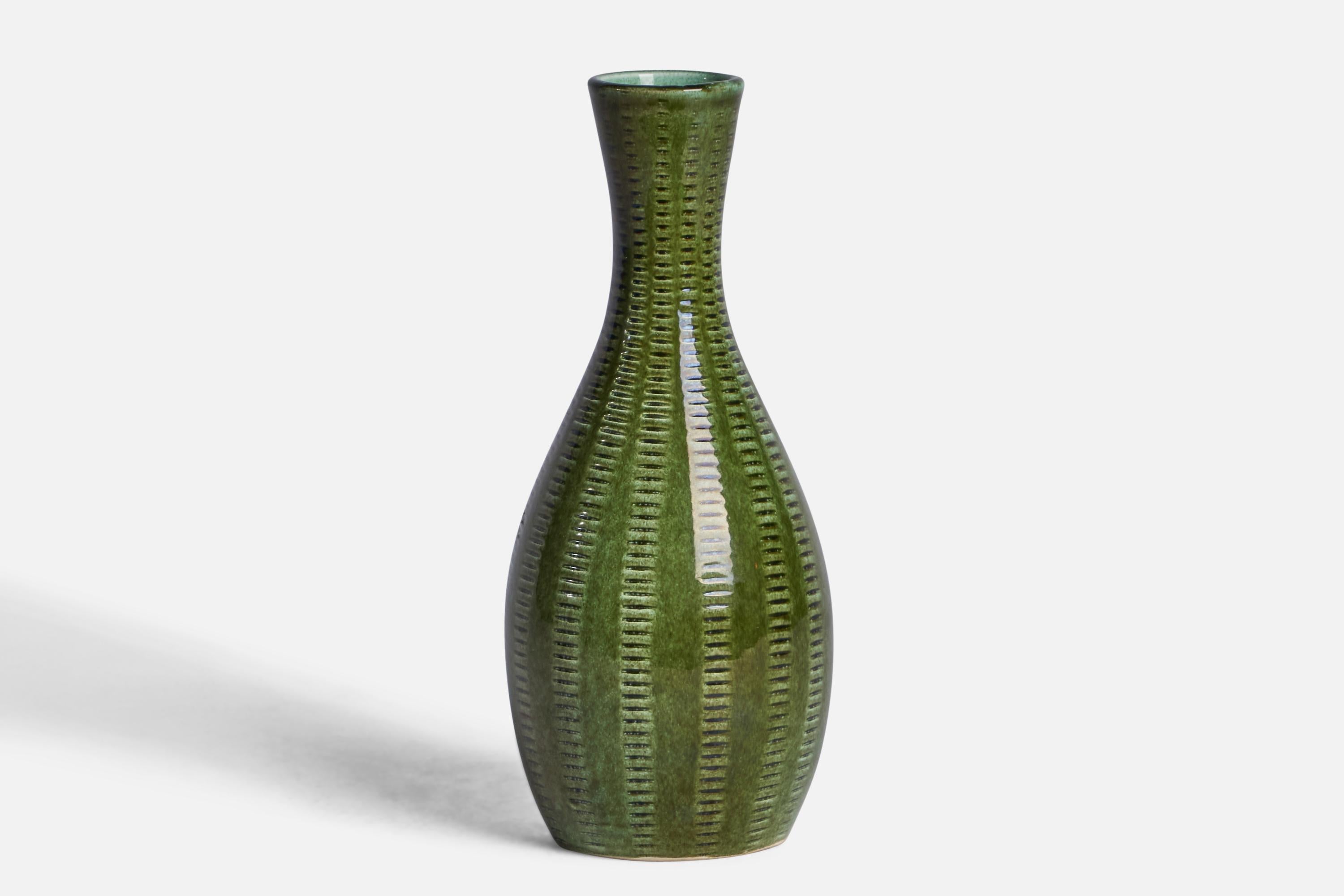 A green-glazed incised ceramic vase designed and produced by Klosterkeramik, Ystad, Sweden, c. 1960s.