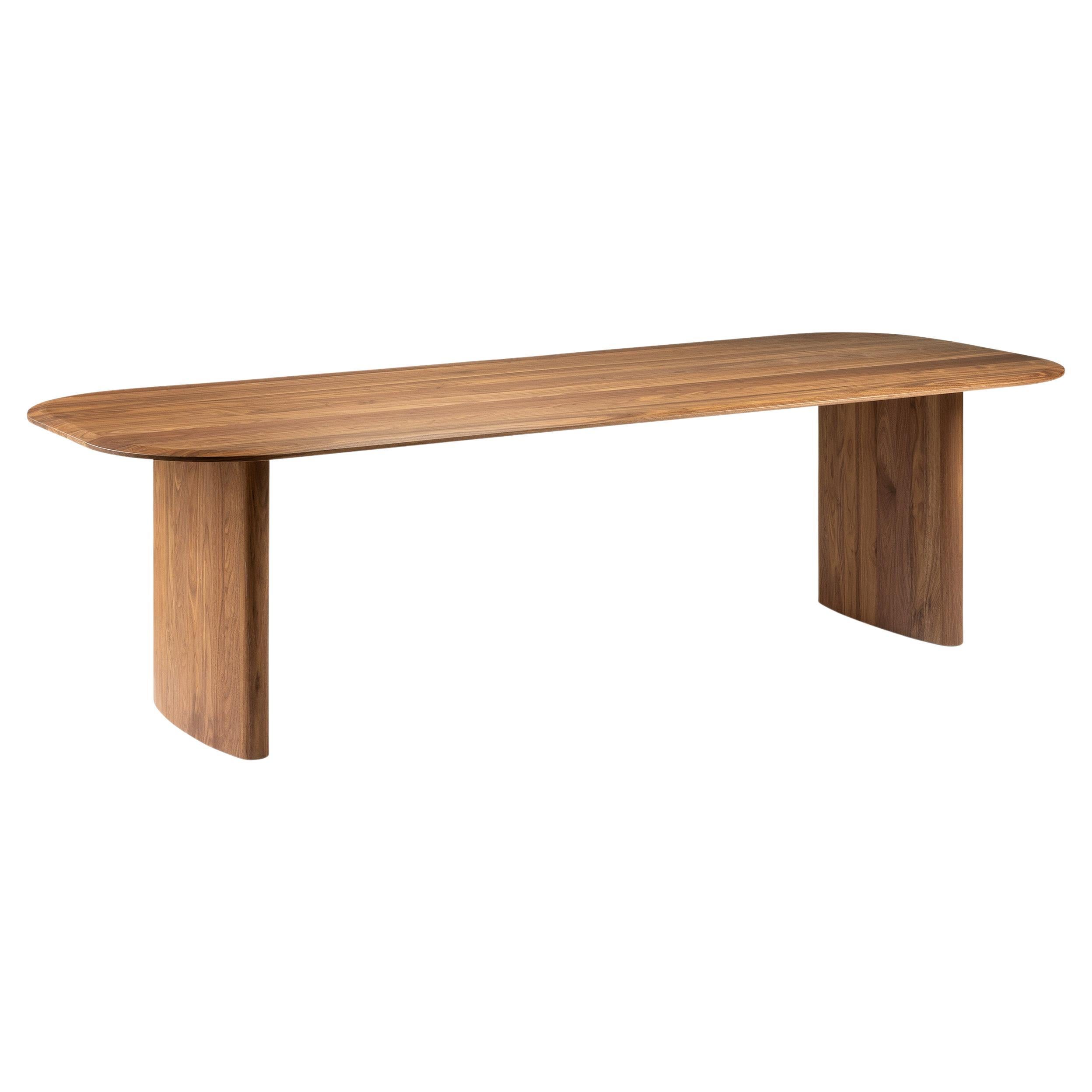 Madeleine Solid Walnut Table

Elevate Your Space with Timeless Elegance

• Product Overview
The 'Madeleine' Solid Walnut Table is the epitome of modern sophistication, combining sleek design with the warmth and richness of solid walnut wood.