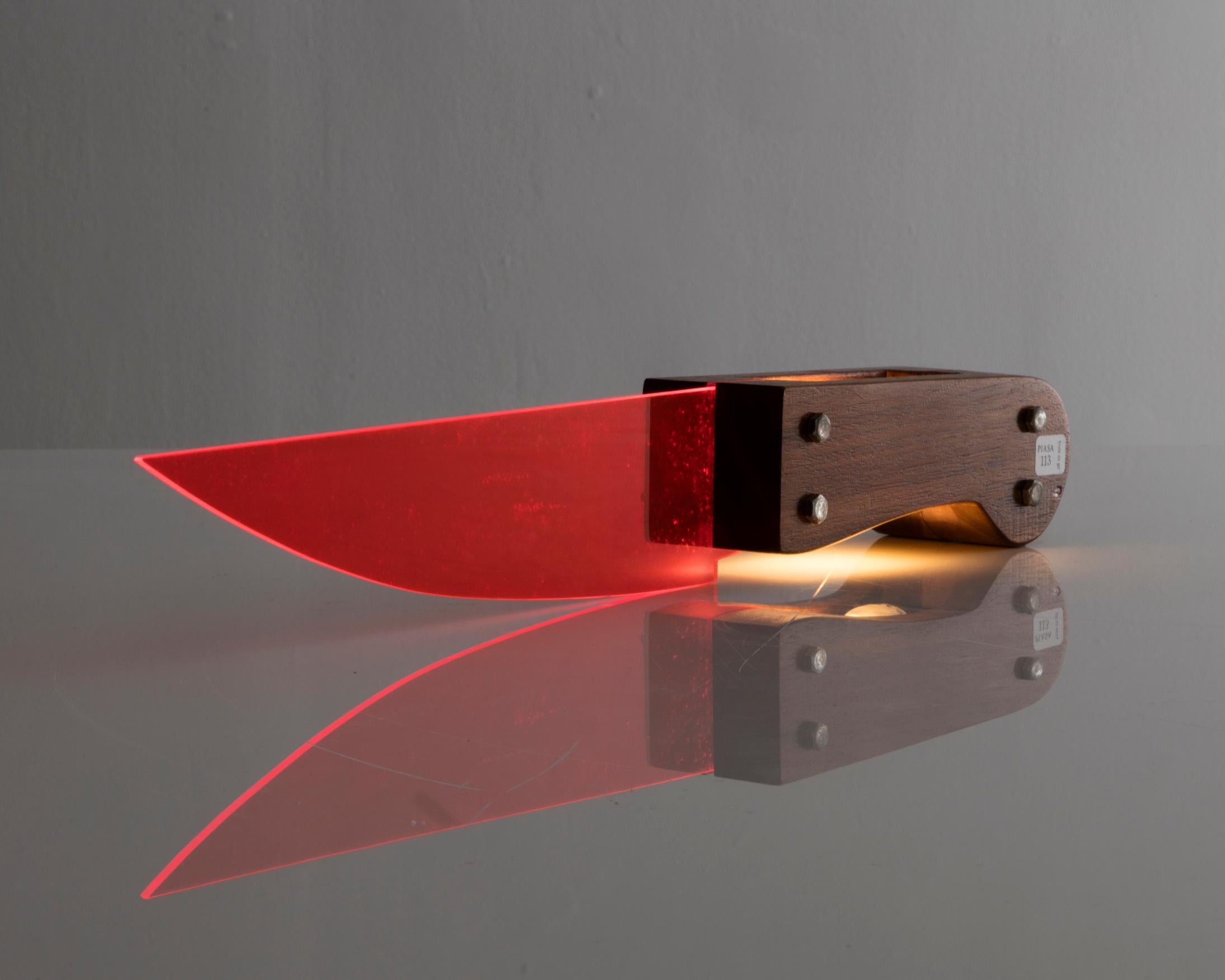 Knife table lamp in walnut and colored plexiglas. Originally designed by Lapo Binazzi, Florence, Italy, 1975. This example is from the edition of twelve, 2011.
 