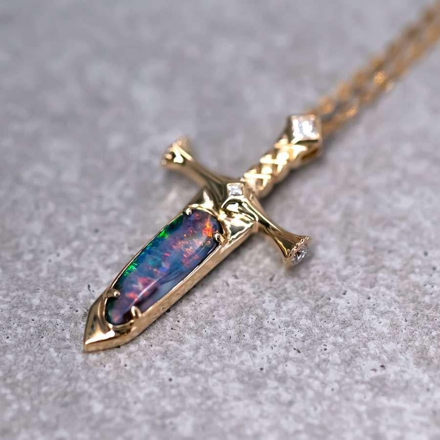 Knight Sword - Australian Boulder Opal & Princess Cut Diamond Pendant Necklace 18K Yellow Gold.

Design Name: Knight Sword

Free Domestic USPS First Class Shipping! Free Gift Bag or Box with every order!

Opal—the queen of gemstones, is one of the