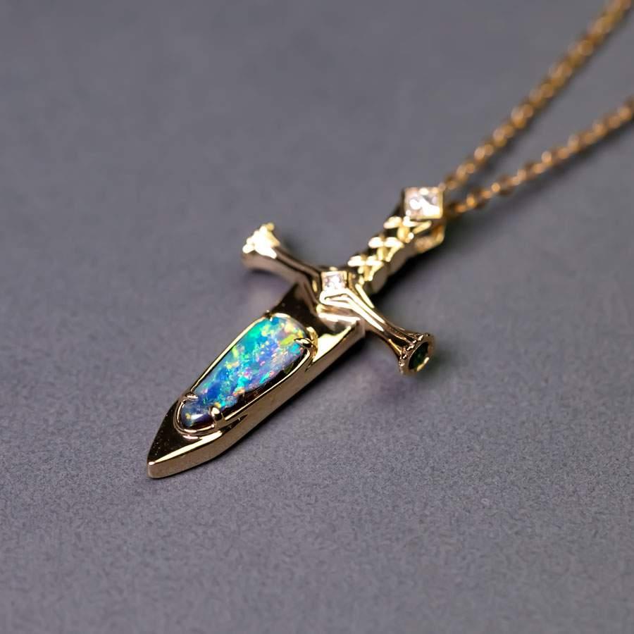 Knight Sword - Australian Boulder Opal 
Princess Cut Diamond Pendant Necklace 18K Yellow Gold.

Design Name: Knight Sword

Free Domestic USPS First Class Shipping! Free Gift Bag or Box with every order!

Opal—the queen of gemstones, is one of