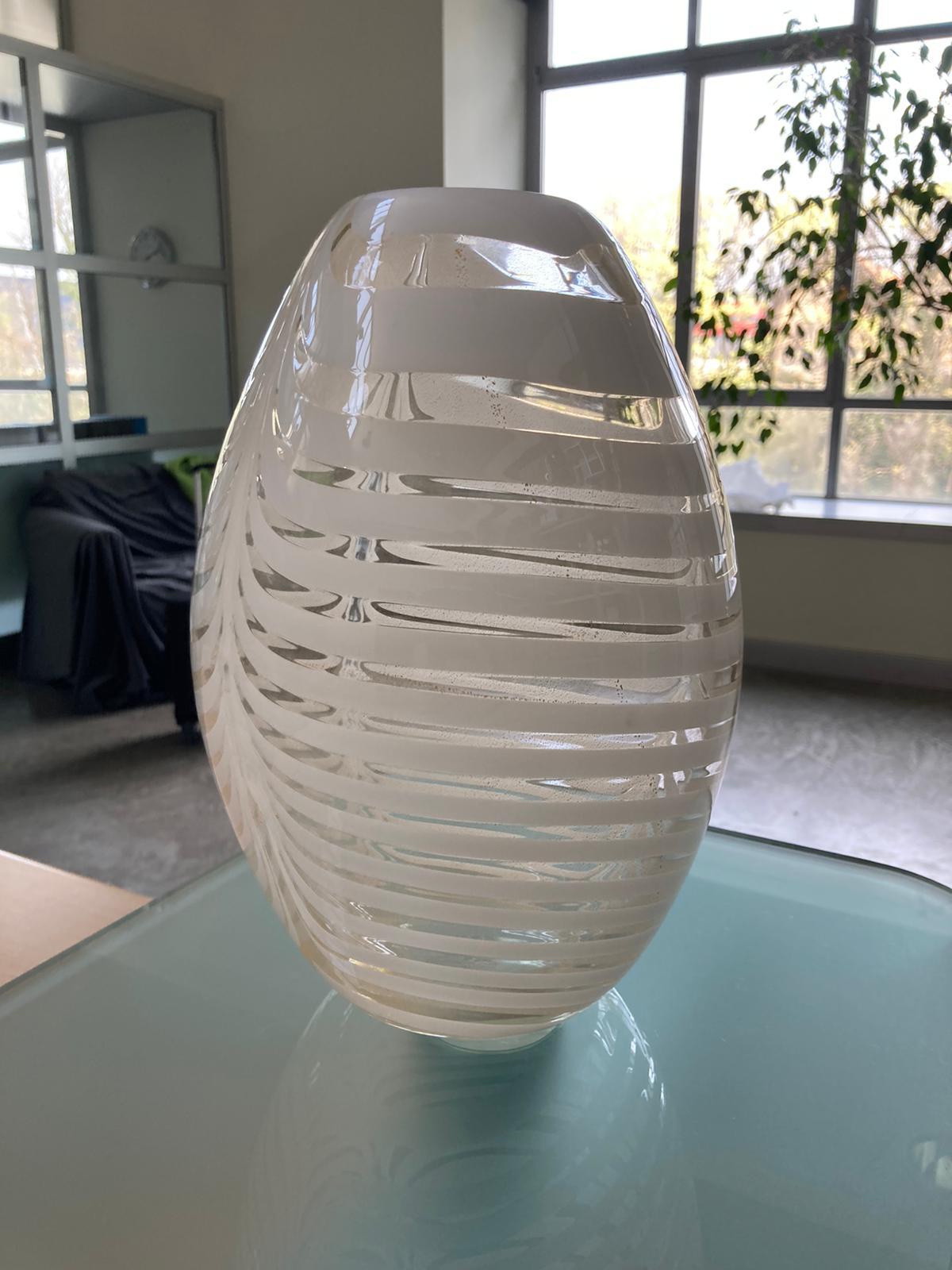 Knight white vase by Purho
Dimensions: D20 x H30 cm
Materials: Glass
Other colours and Dimensions are available.

Purho is a new protagonist of made in Italy design, a work of synthesis, a research that has lasted for years, an Italian soul and