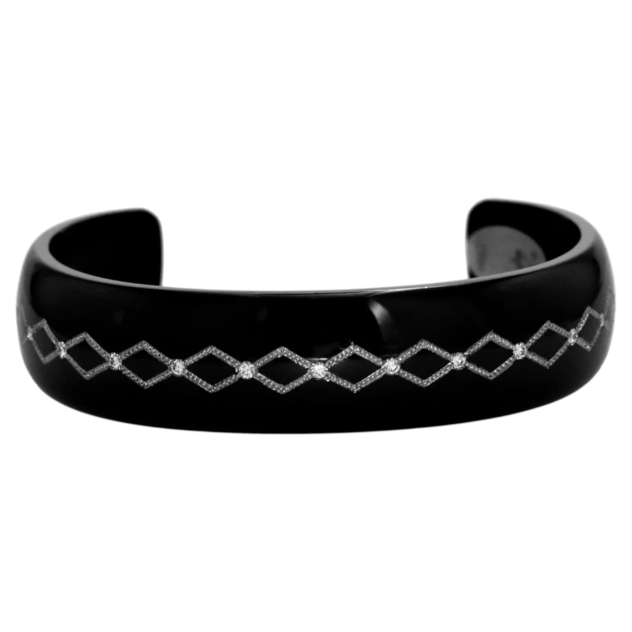 Bracciale con bracciali aperti in Knightsteel e diamanti platino di Zoltan David