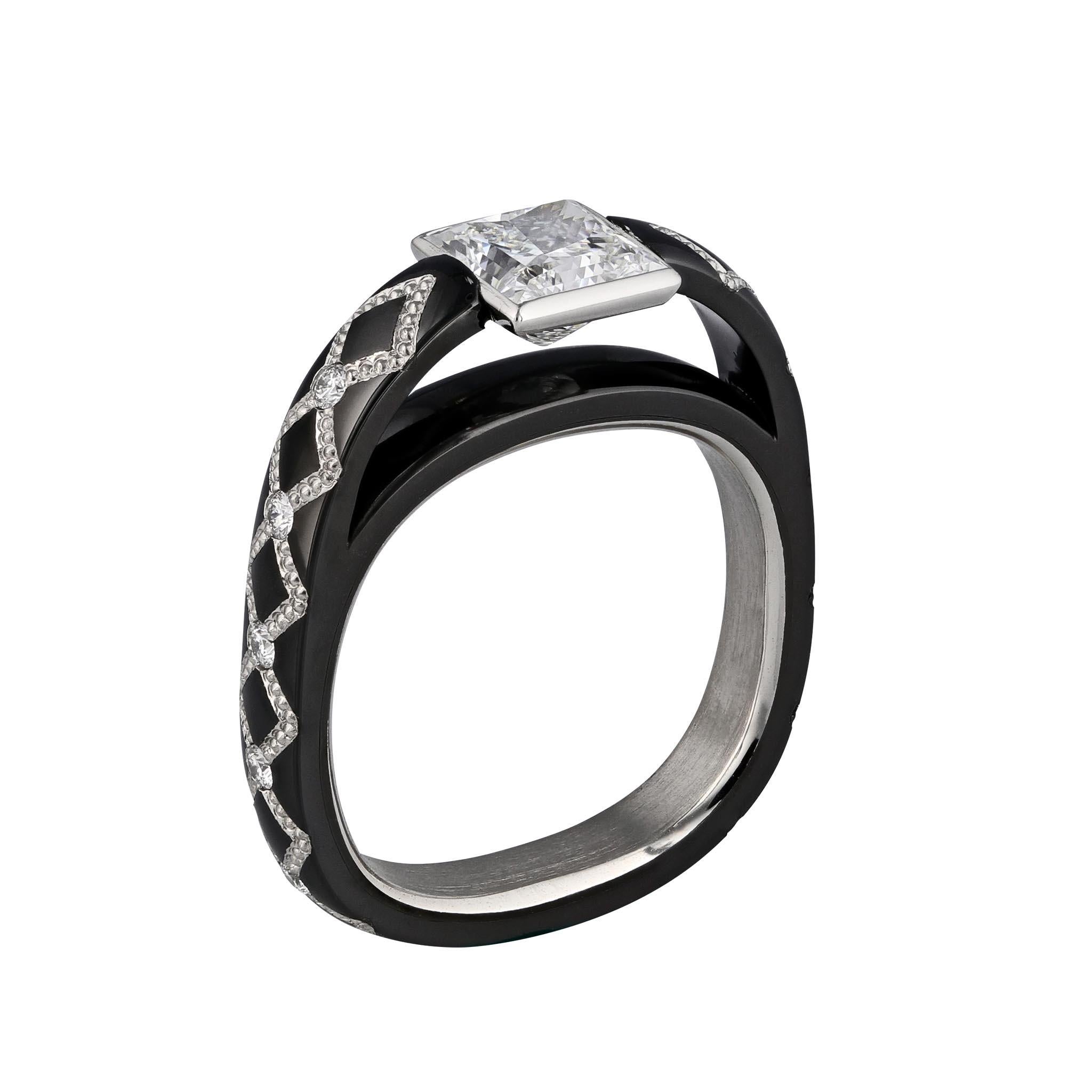 The Firemark princess cut Zen diamond engagement ring by Zoltan David is the epitome of innovation and elegance. Crafted from Knightsteel, an exceptionally durable and dark-patinated metal, the ring features a pure platinum inlay and a platinum