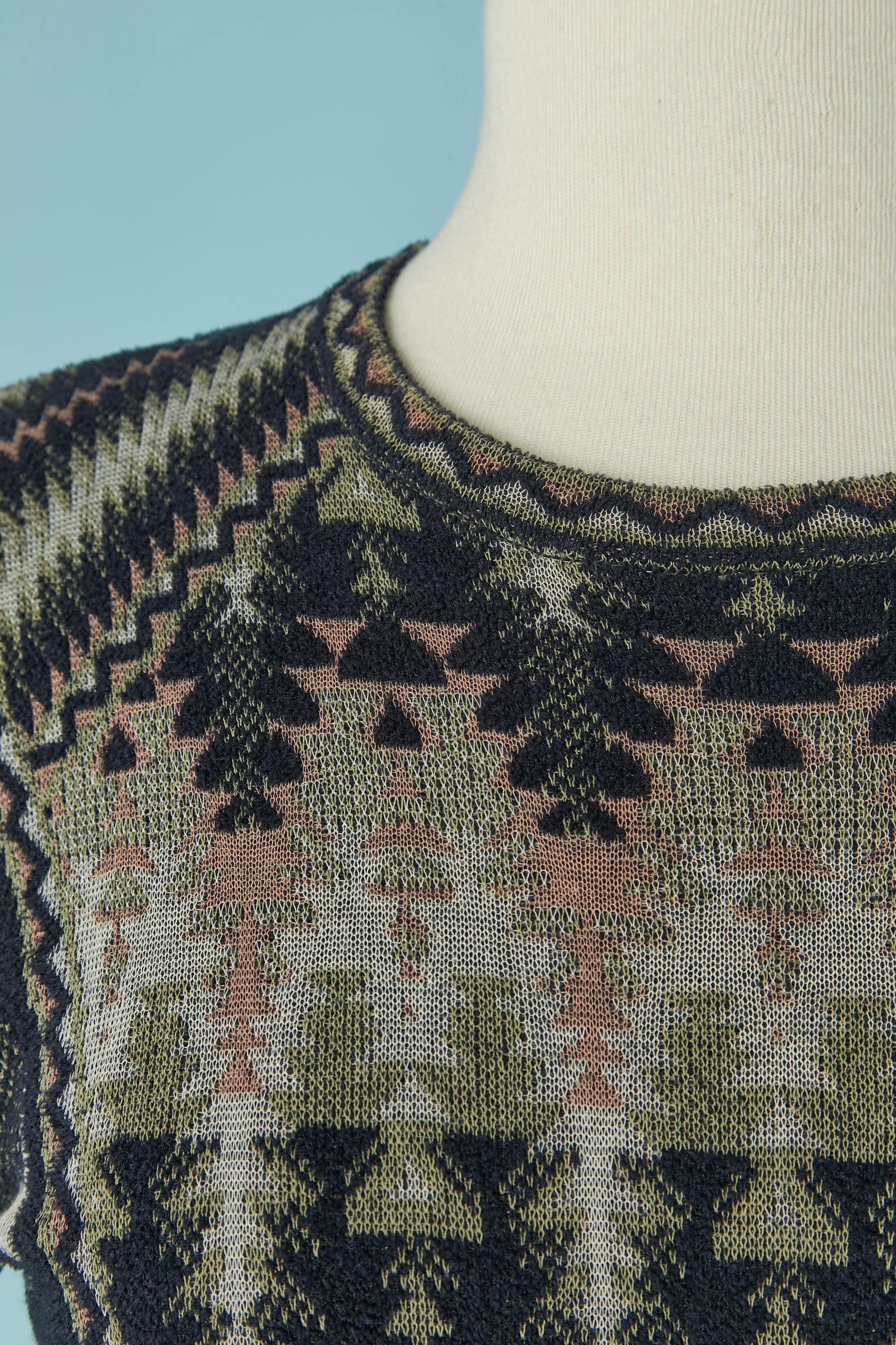 Abito in maglia jacquard. L'etichetta della composizione del tessuto è stata tagliata, ma probabilmente si tratta di lana e rayon. 
dimensione S 