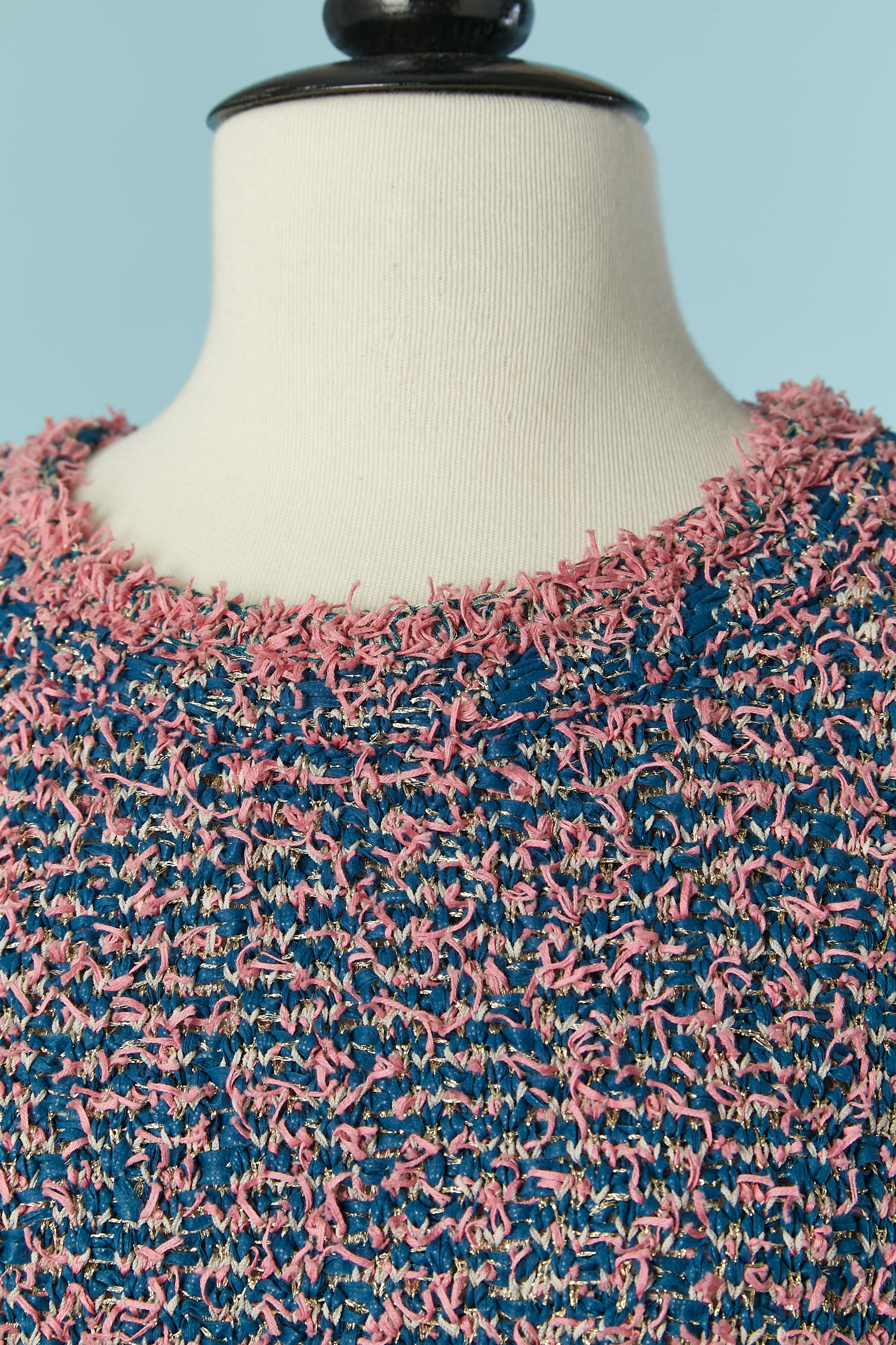 Knitted chiné short sleeve dress with pocket on both side. 
Fabric composition: 42% nylon, 40% cotton, 7% rayon, 7% cupro, 4% polyester + Lurex thread. 
SIZE 38 (Fr) M 