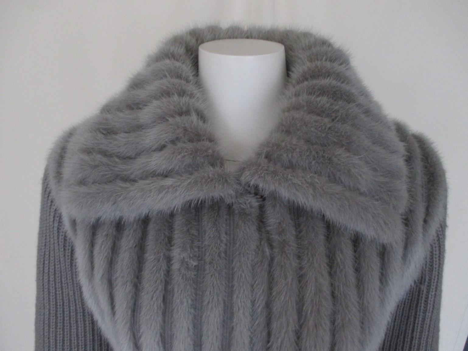 This mink fur jacket/vest is made of very soft mink with wool sleeves and lining .

We offer more beautiful fur items, see our frontstore.

Details:
2 pockets,  1 collar hook and 3 closing hooks.
Size fits as medium/large
See section measurements