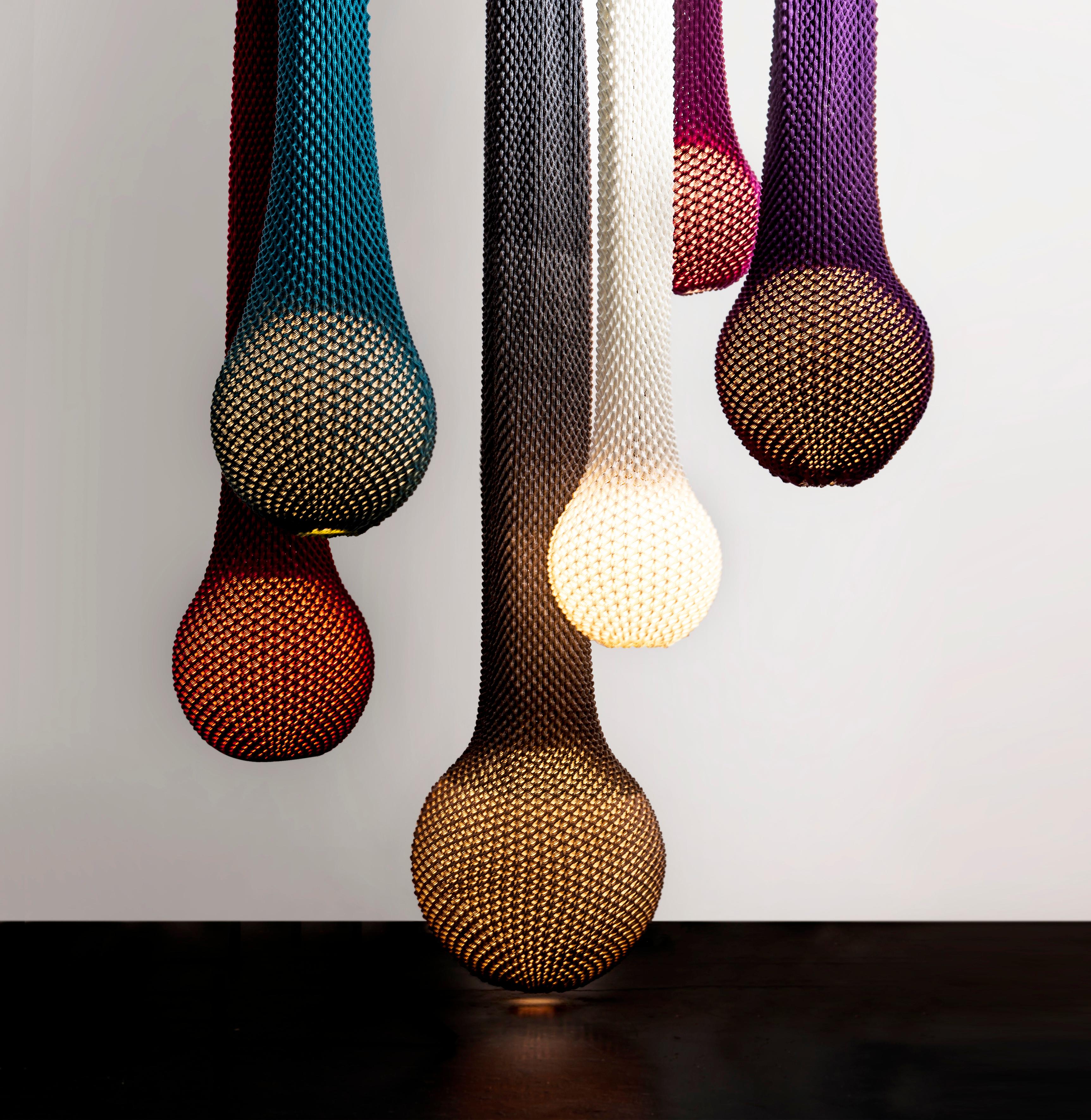 The Knitted lighting is an award-winning collection 
series of lightings that combines technology with tradition.
Knitting acrylic threads in fixed patterns with wool crochet, creates a three-dimensional sheet of fabric which serves as a lighting