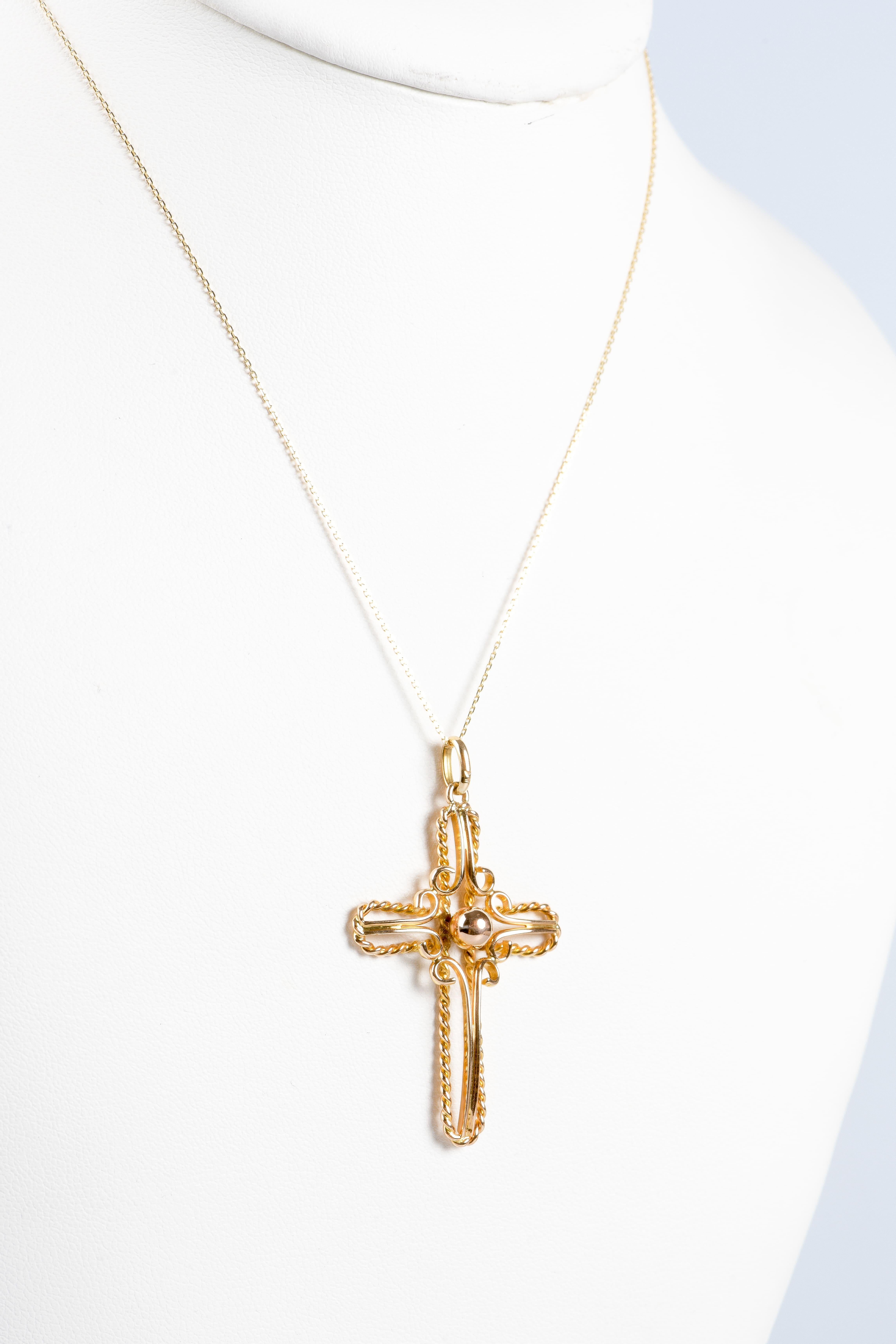 Knitted necklace with cross-shaped pendant in 18K yellow gold.  For Sale 1