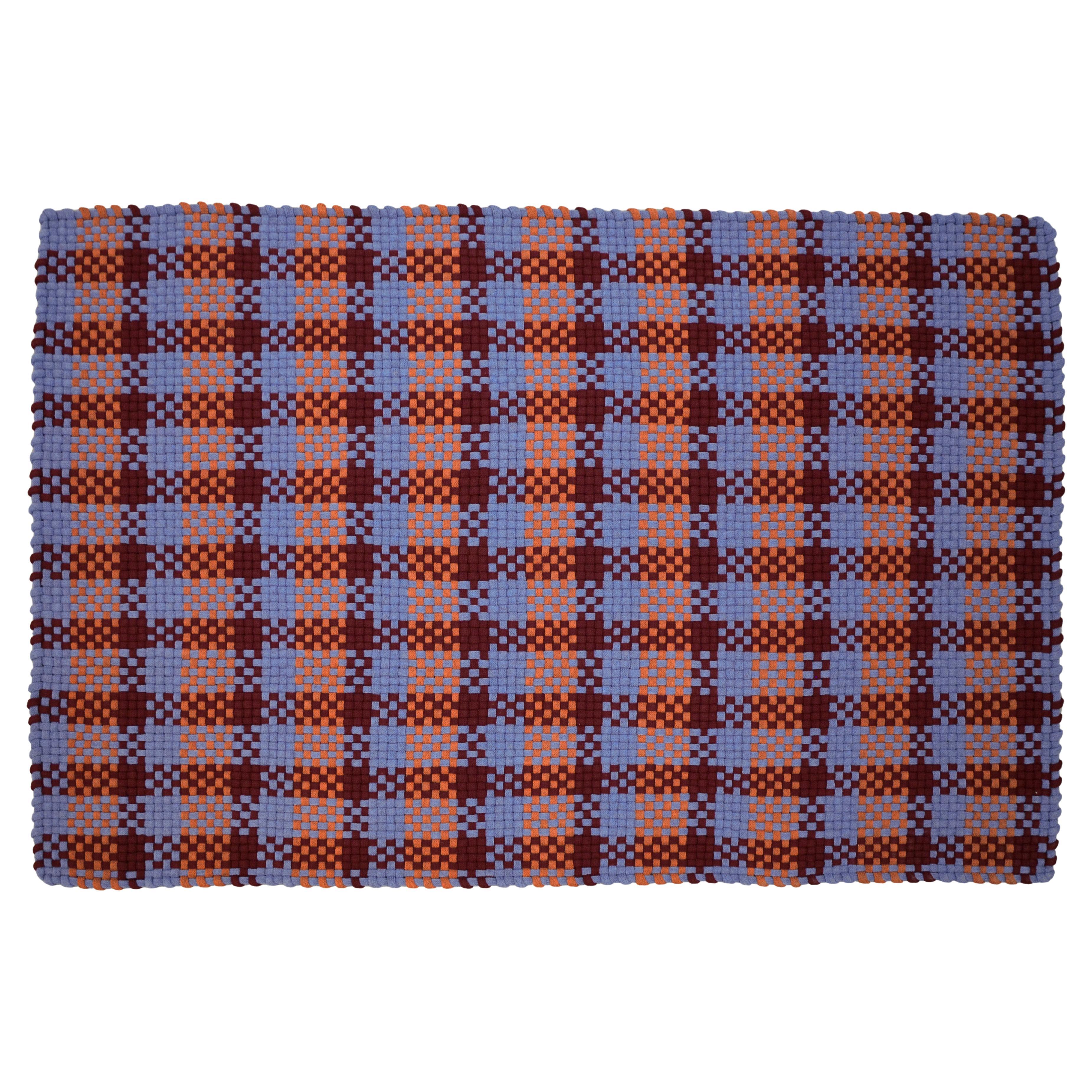 Tapis tricoté en laine Pyra par Lisa Darland