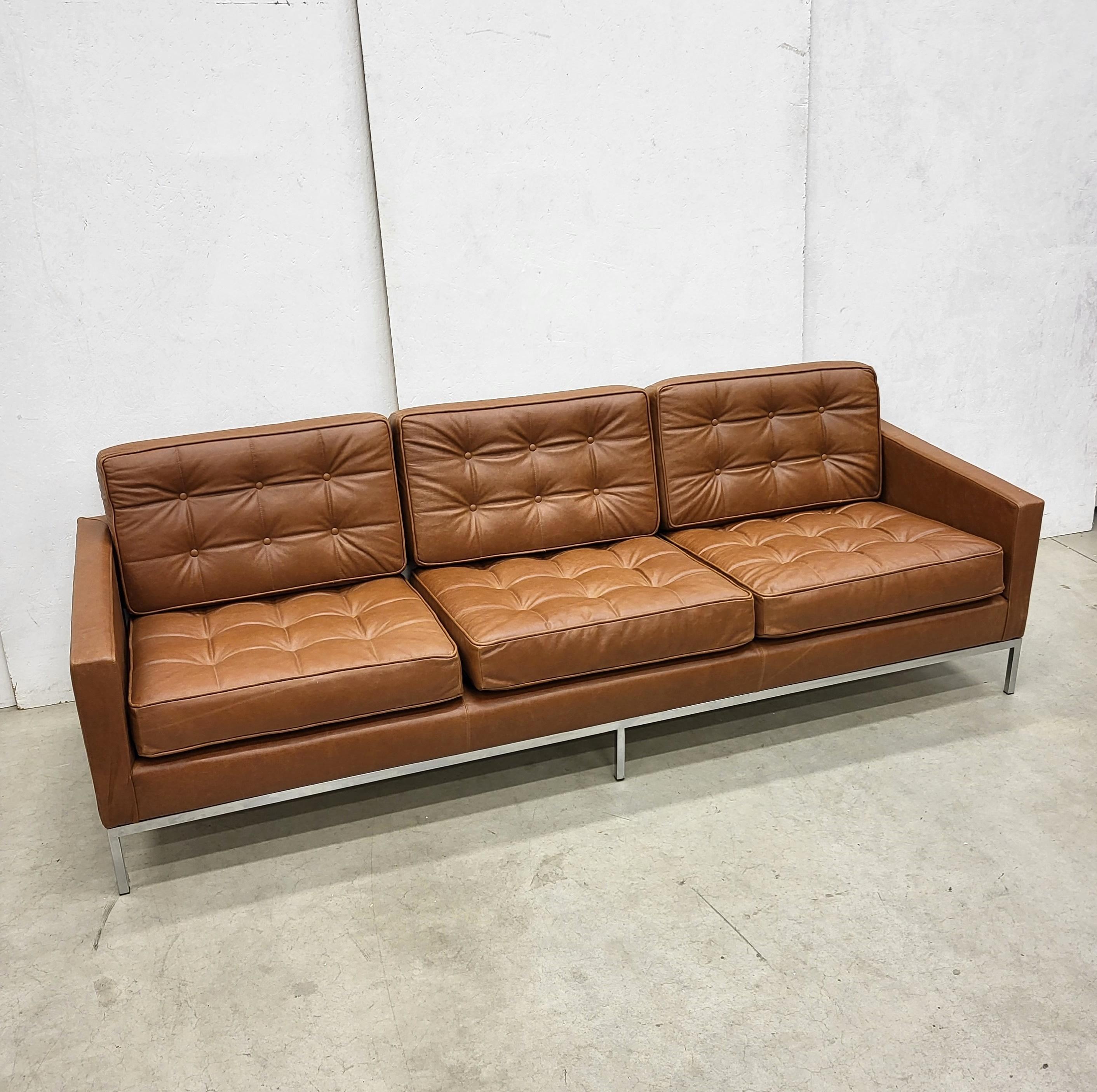 This timeless iconic sofa was designed in 1954 by Florence Knoll and produced by Knoll in the 1970s. 

The sofa is upholstered in an amazing Mid Brown Cognac leatherand has been restored completely. 
Overall it is in mint condition.

The sofa