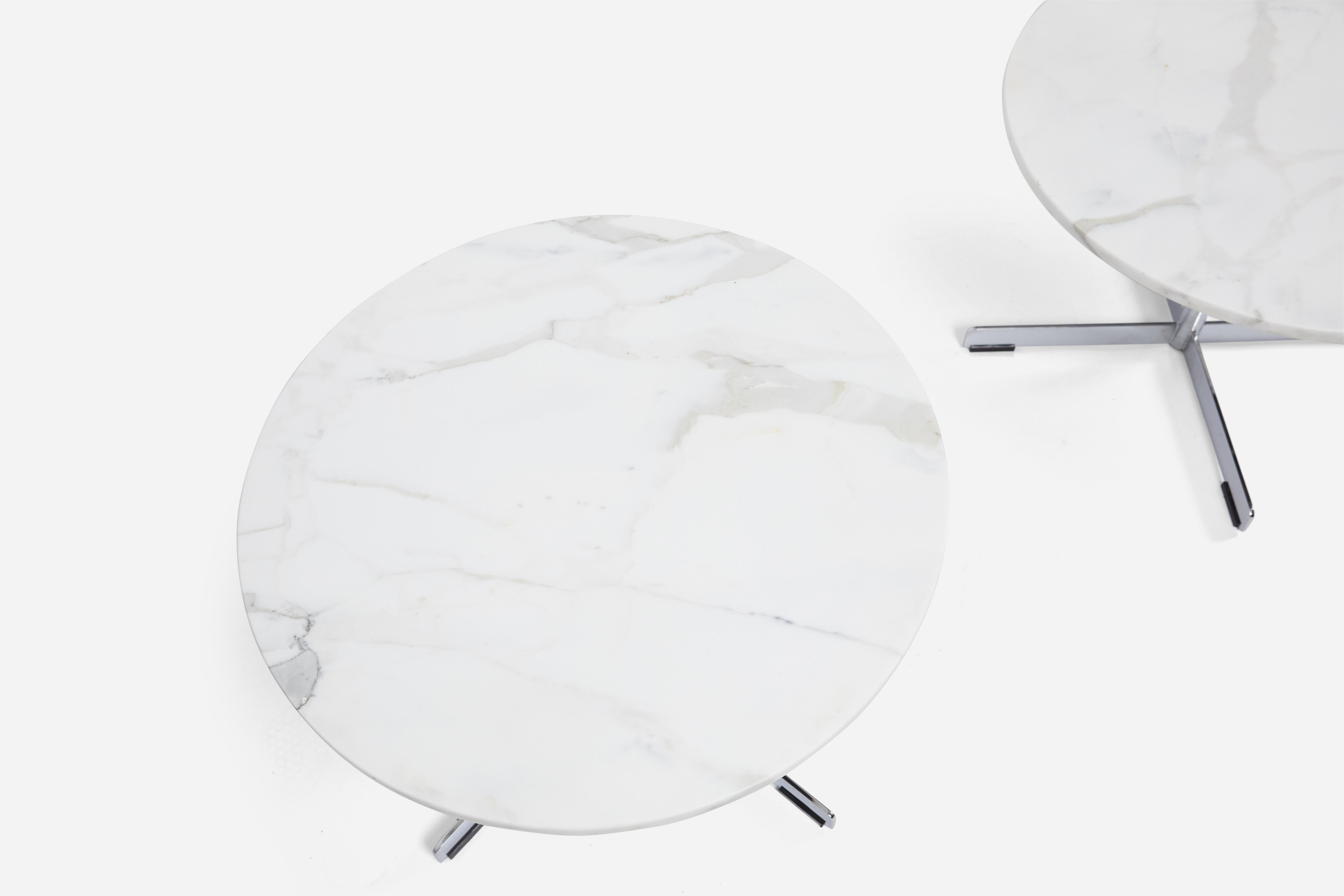 Pair of architectural round side tables, circa 1960. White marble tops on stainless steel tripod bases.