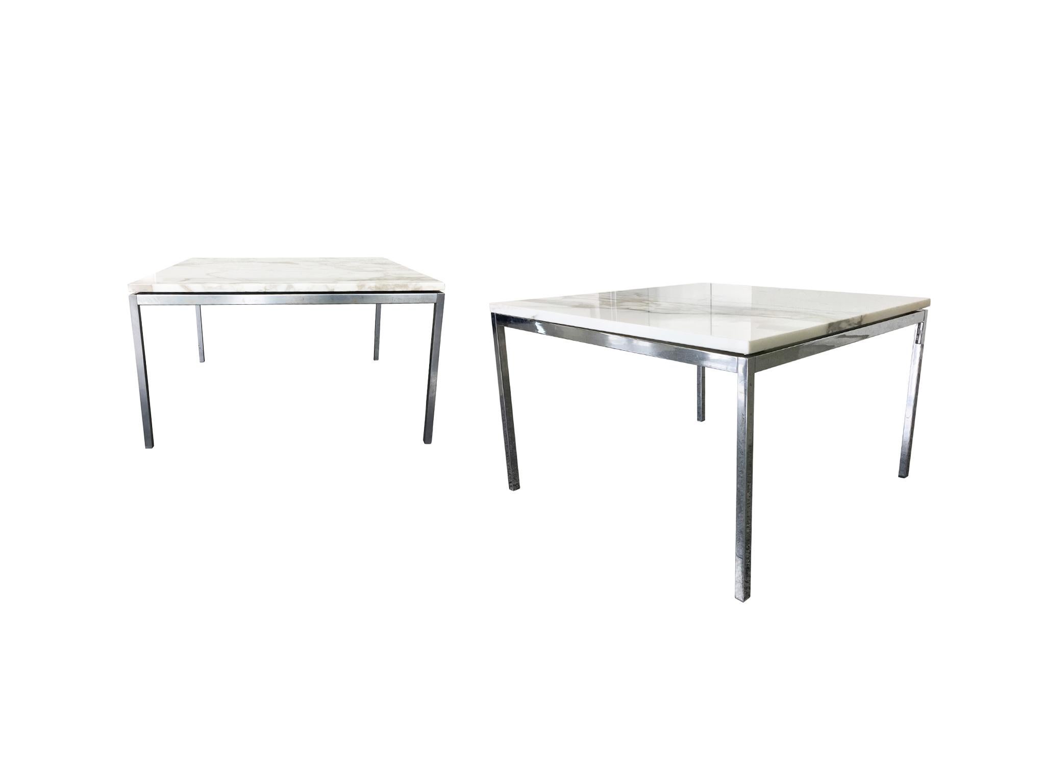 Elegant side tables attributed to Knoll. Manufactured in the 20th century. There are two available. One table measures 30 inch square. The other table measures 27 in square. Each is is comprised of a white marble top and chrome base & legs. The