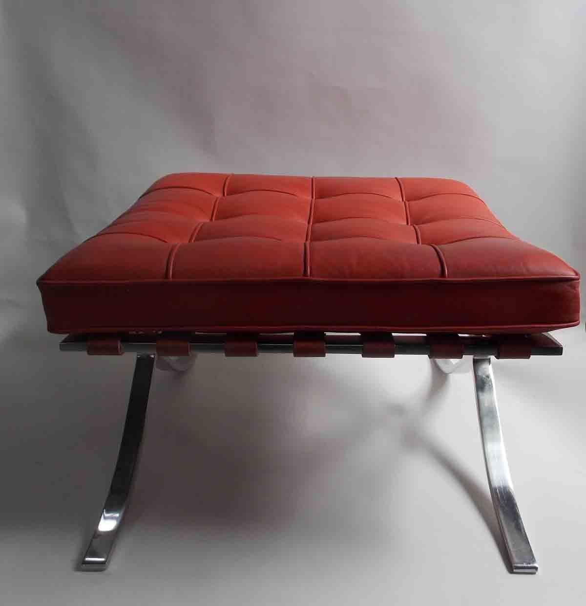 Red Barcelona Ottoman manufactured by knoll 
See photo with Hermes Orange Handbag to 
give you a sense of color
label present.
 