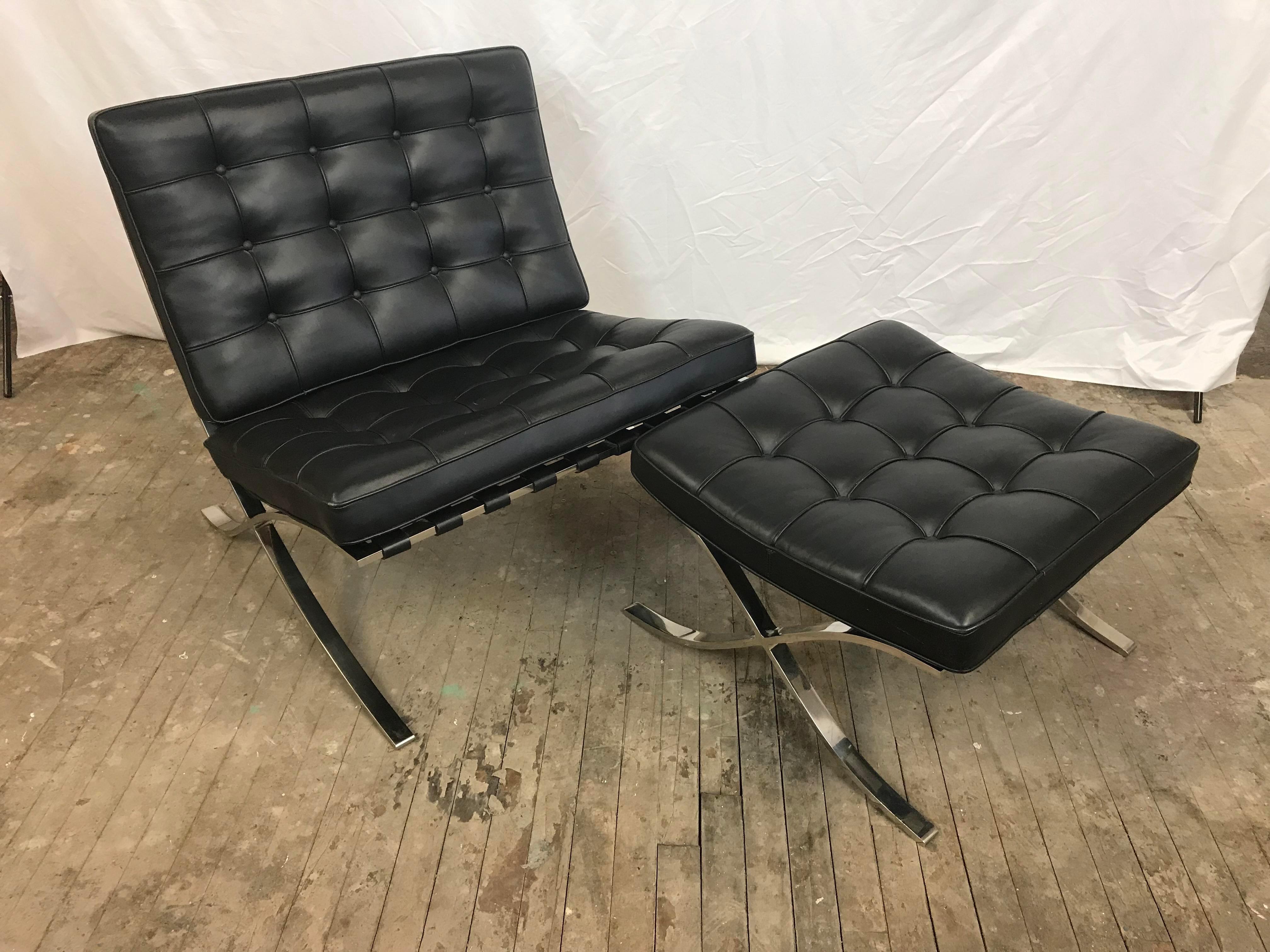 Genuine Knoll International version of Mies van der Rohe's famous Barcelona chair and ottoman stool. 

The chair measures 29 1/2 inches wide, 30 deep and 30 1/4 inches tall. The seat height is 17 inches. The stool is 25 inches wide, 23 1/4 deep