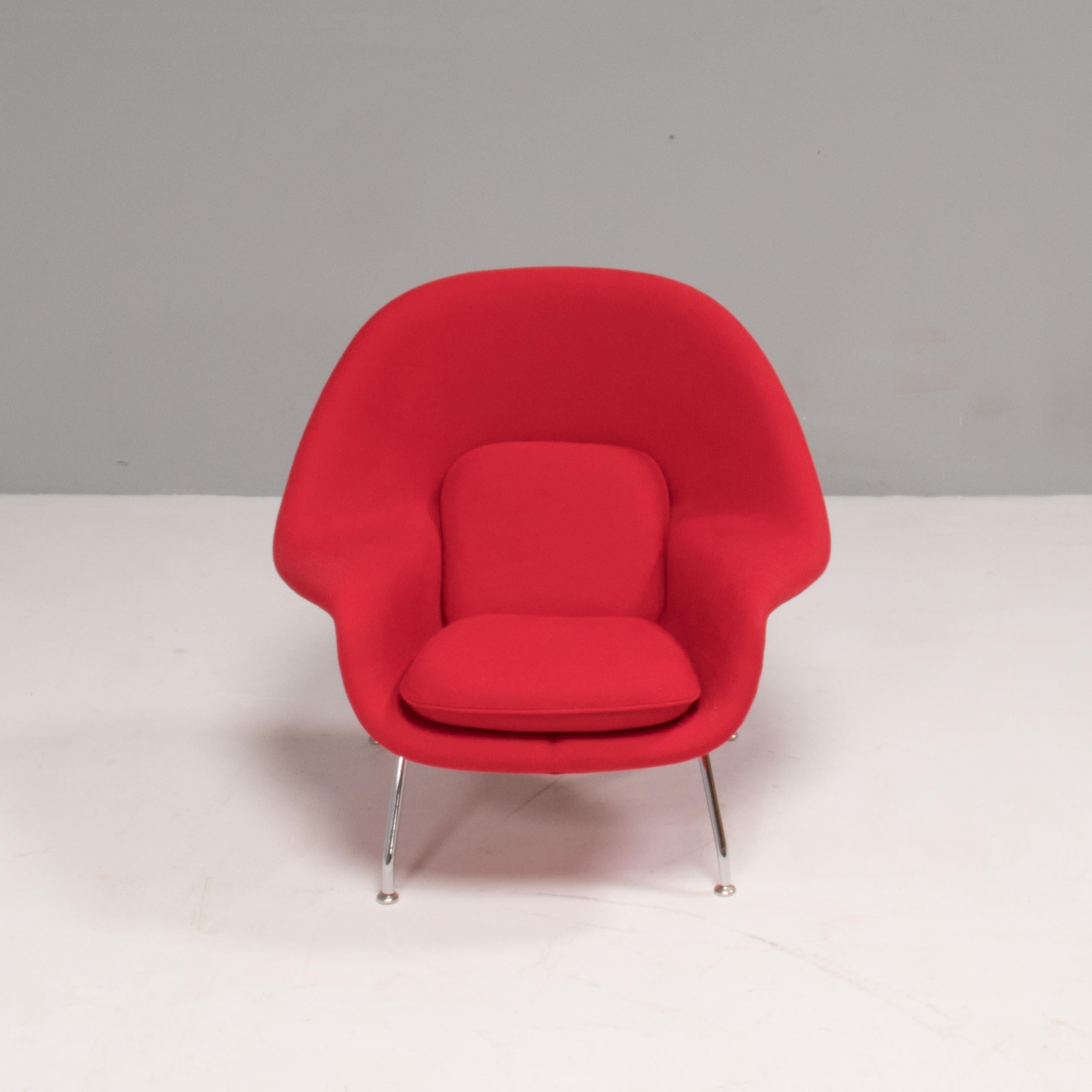 This iconic chair was designed by prolific designer Eero Saarinen in 1948. 
Eero Saarinen designed the groundbreaking womb chair at Florence Knoll's request for “a chair that was like a basket full of pillows - something she could really curl up