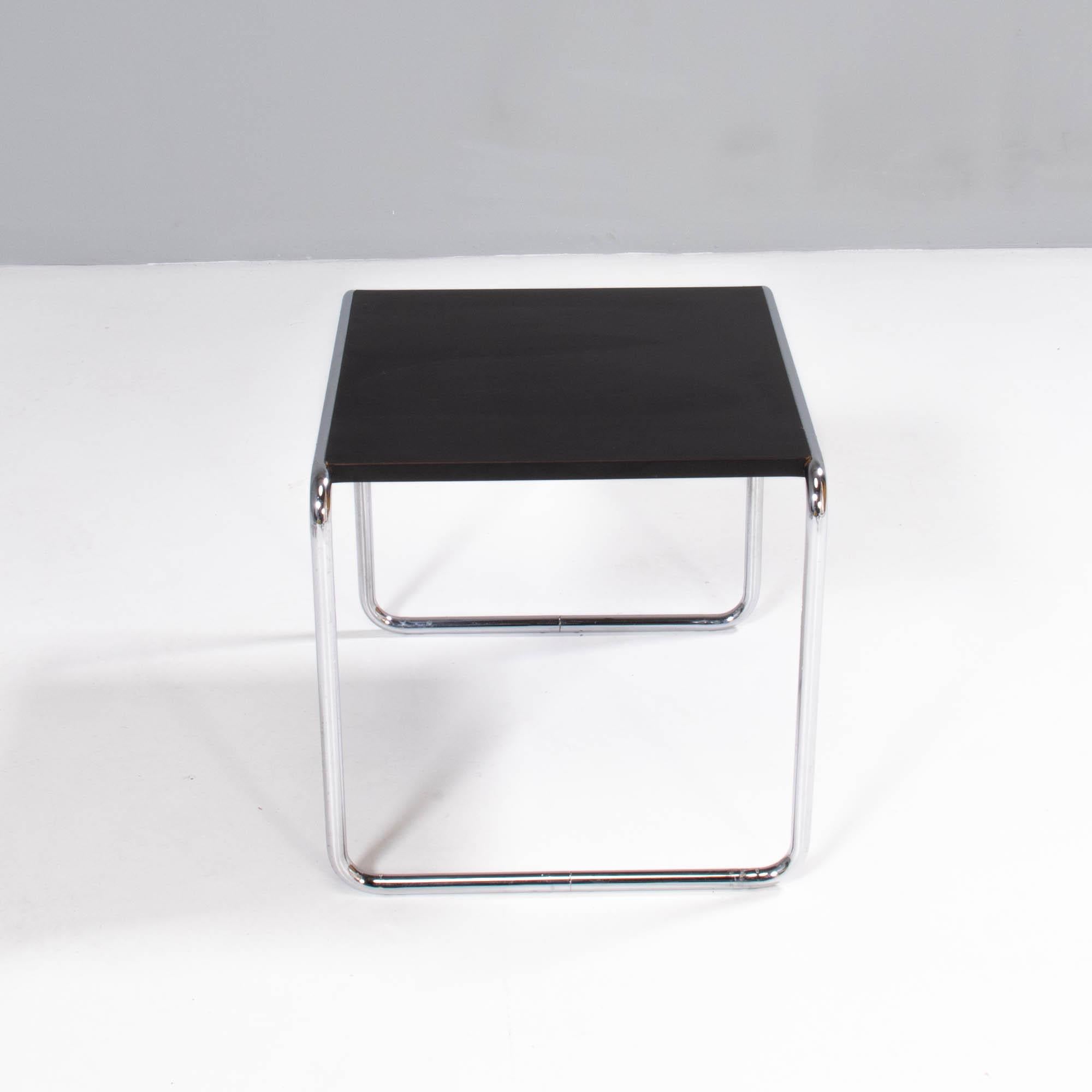 Originally designed by Marcel Breuer in 1925, the Laccio side table has become a true design icon.

Using the tubular steel of his other designs, the Laccio side table features Breuer’s famous blend of curves and sleek lines.

The polished