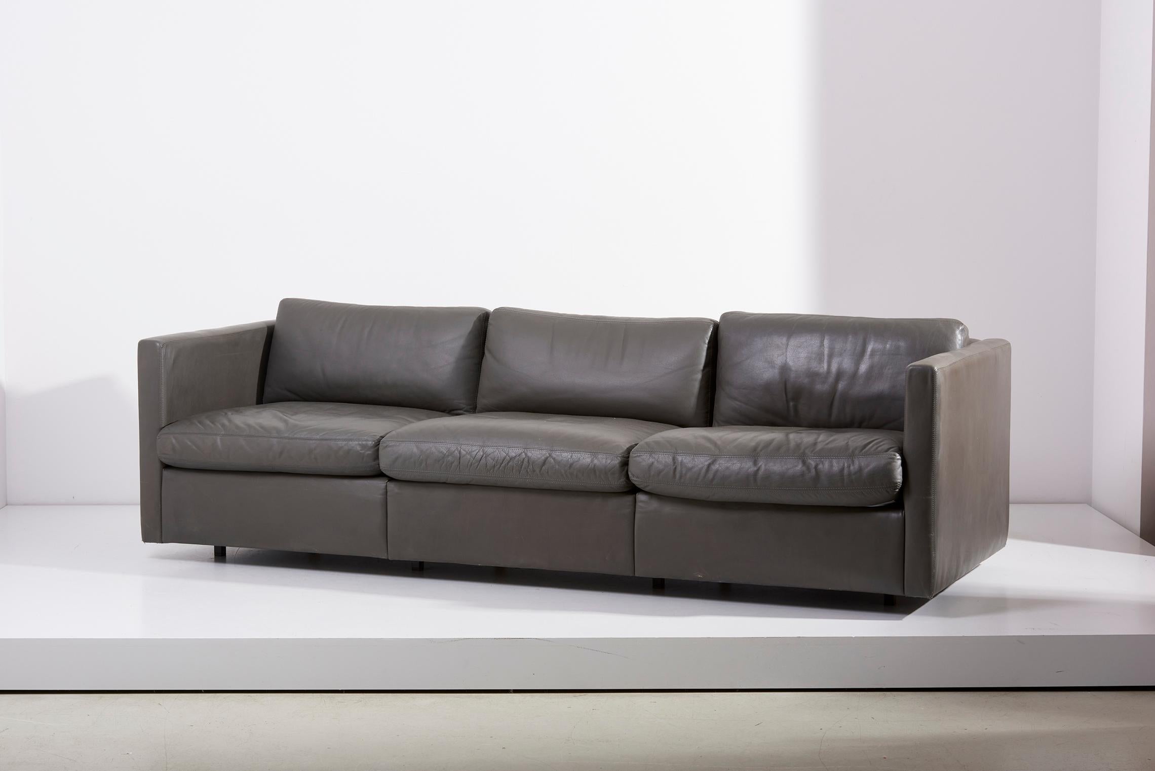 A original three-seat leather sofa design in 1971 by Charles Pfister for Knoll. Original grey color Knoll leather. Overall dimensions: 86” wide, 33” deep, 29” high, 16” seat, 24” arm height.
Size of the lounge chairs is in the listing.