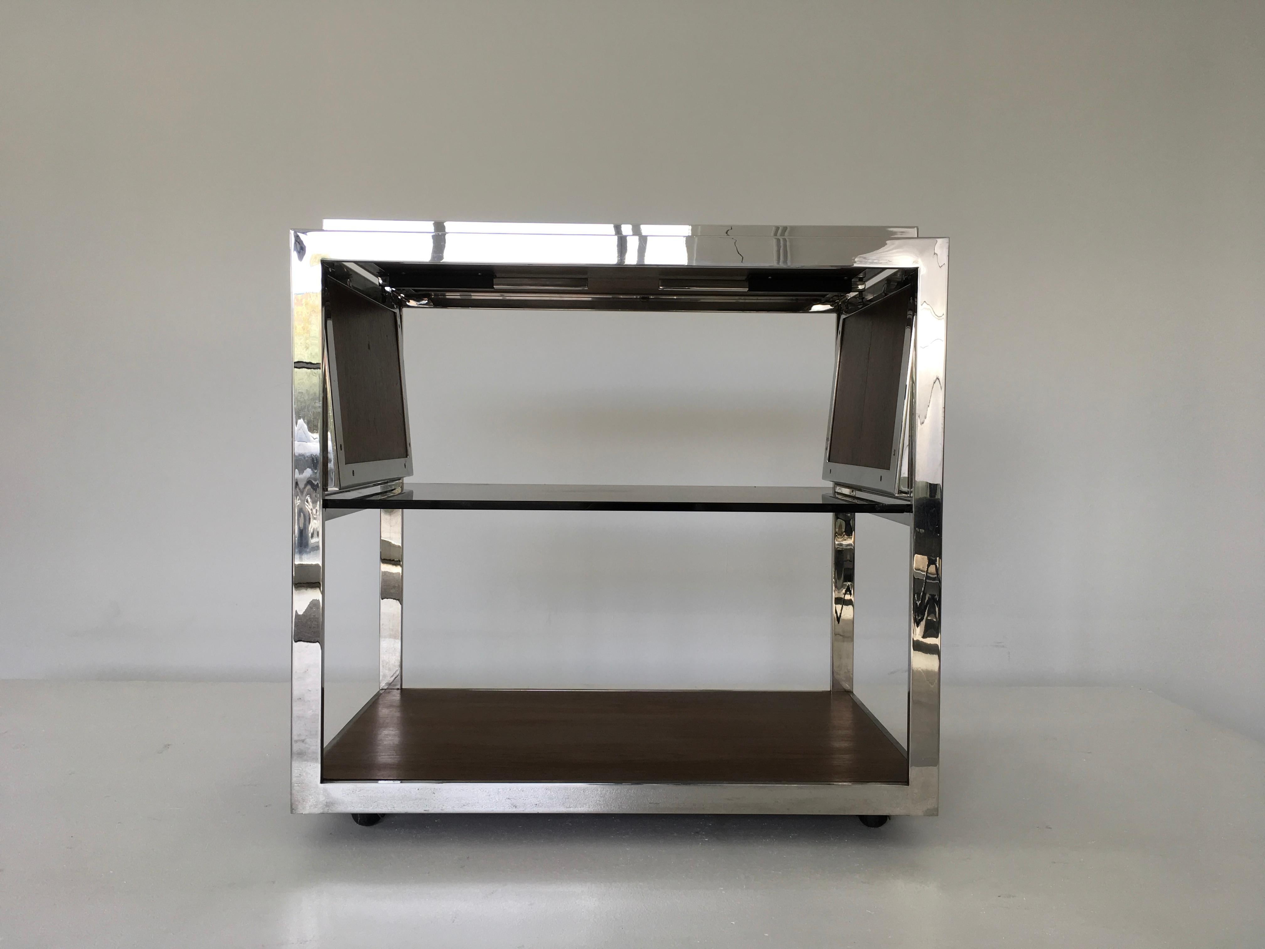 An unusual form. 2 available. Labelled Knoll International.