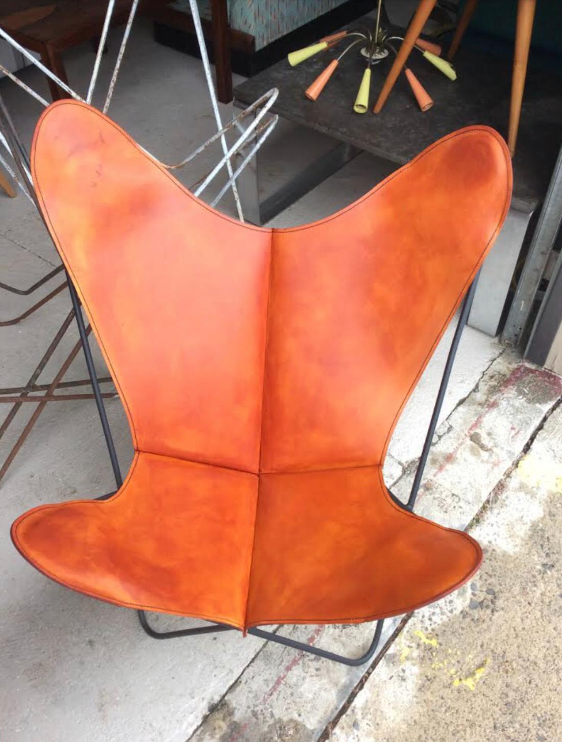 Knoll or Hardoy BFK wrought iron butterfly chairs with leather slings. Brand new thick leather four piece slings, with heavy duty stitching, brass rivets and hand rubbed aged finish. They were copied from an original cover, hand made and fit like a