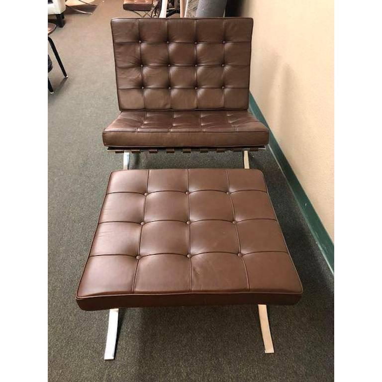 A Knoll International vintage Barcelona chair and ottoman. Designed by Ludwig Mies van der Rohe. A classic set that never goes out of style. Rich dark brown leather. Measure: Seat height is 16 inches. Ottoman dimensions: W 23 inches x D 25 inches x