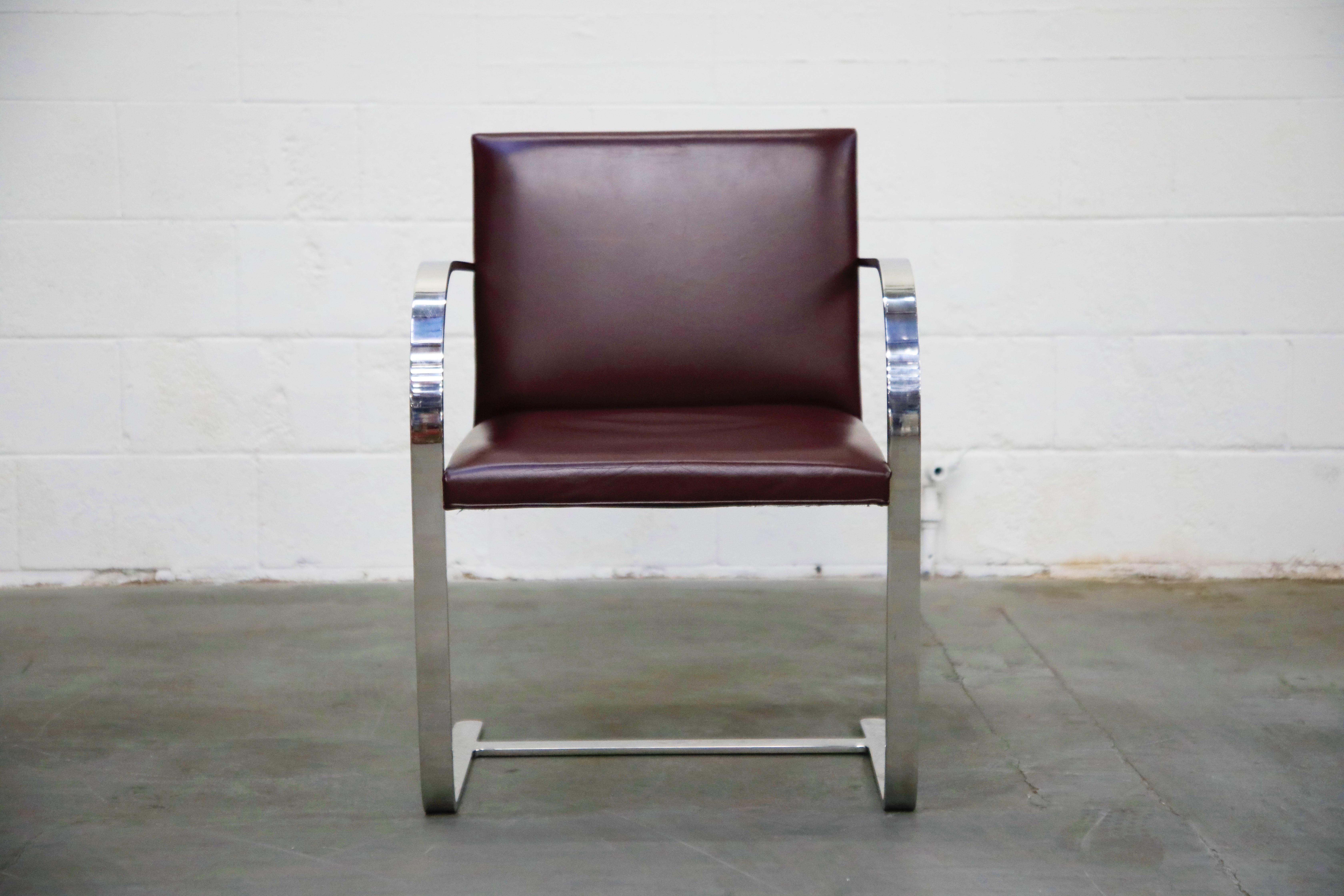 This set of six (6) signed (authentic) Knoll International 'Brno' Chairs are in an incredible deep burgundy leather. These collectible 2nd generation productions by Knoll International have an attractive and lovely patina to the leather and is