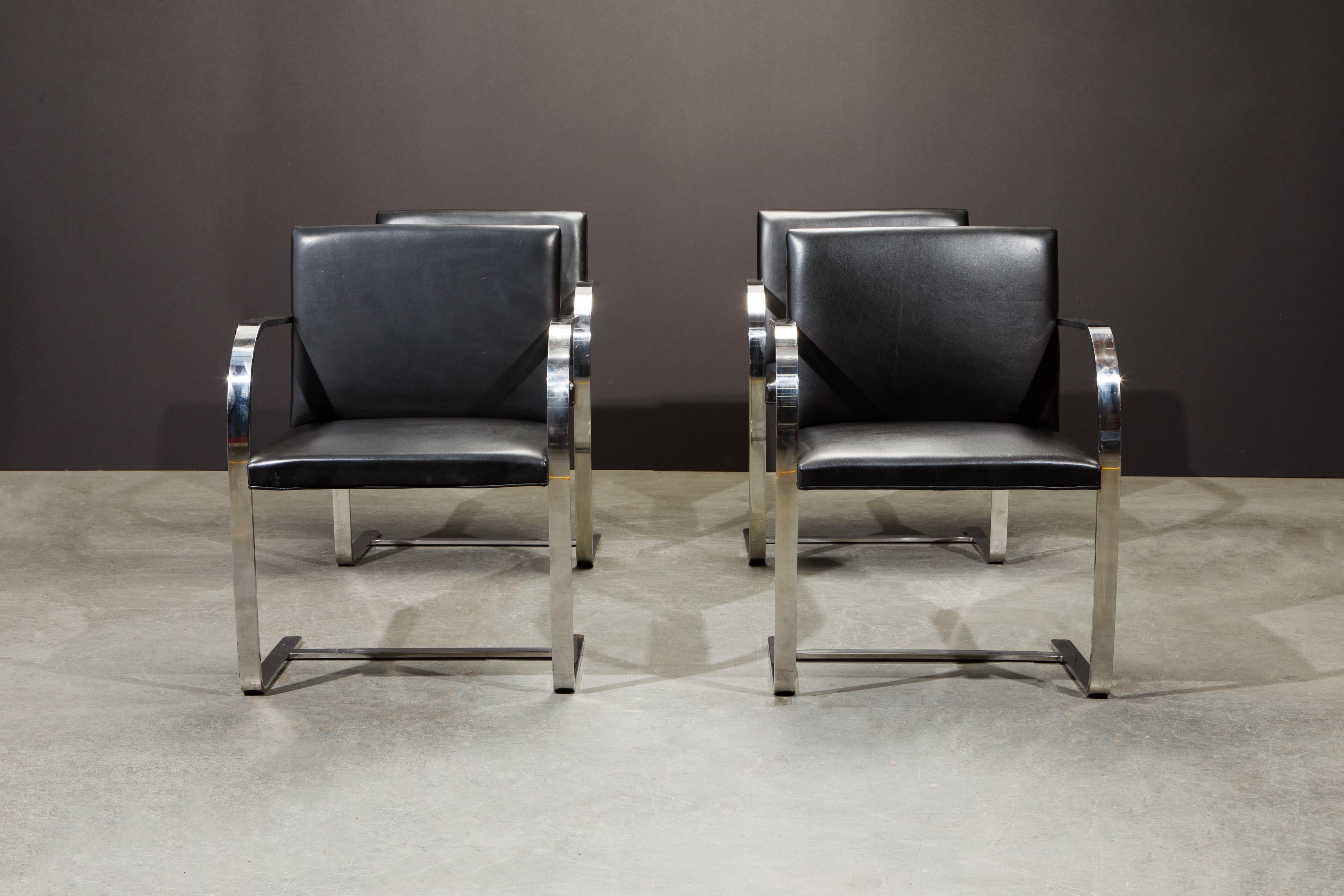 This set of four (4) signed (authentic) Knoll International 'Brno' Chairs are in an incredible black leather. These collectible 2nd generation productions by Knoll International have an attractive and lovely patina to the leather and is signed and