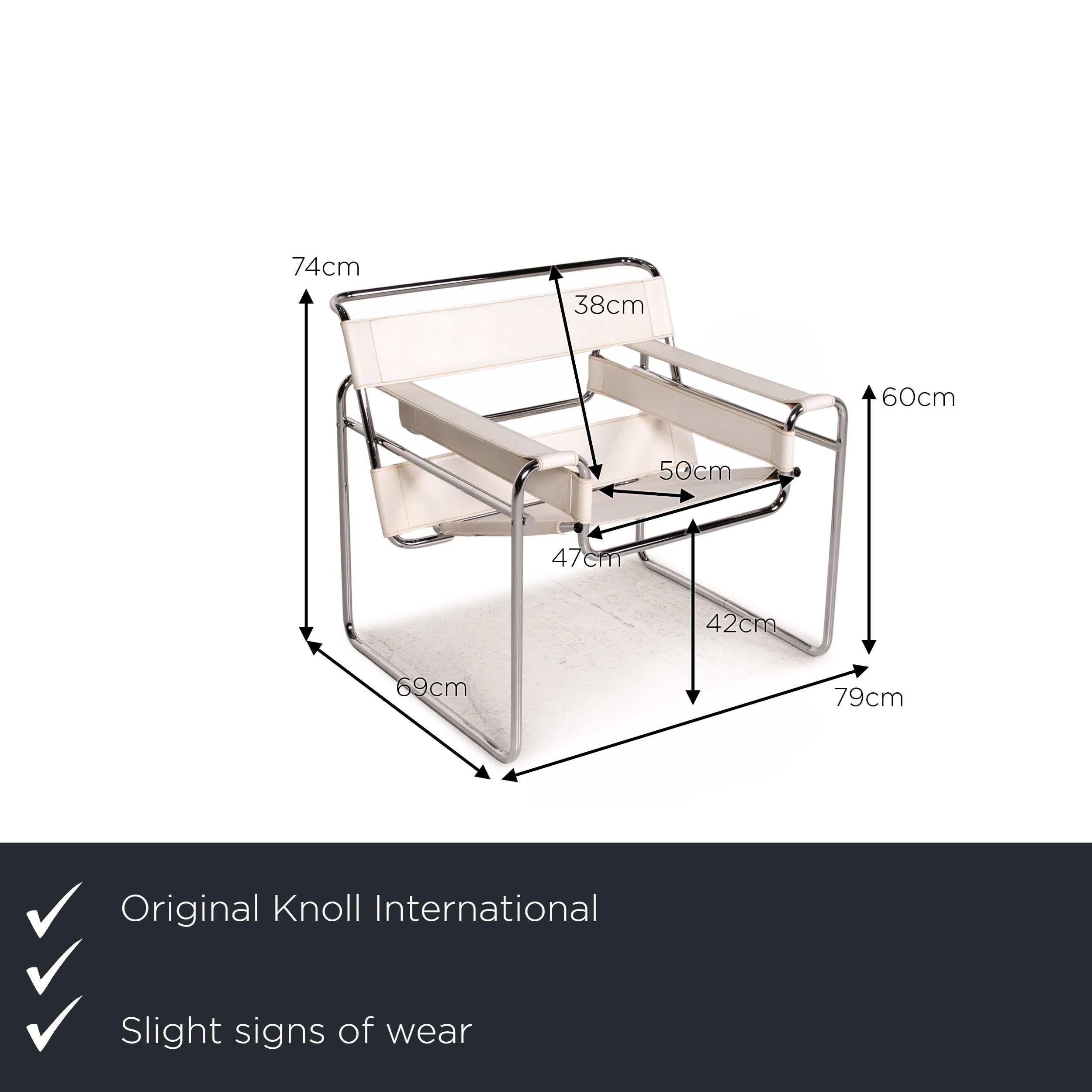 We present to you a Knoll International Wassily chair leather armchair white chair Marcel Breuer.

Product measurements in centimeters:

Depth 69
Width 79
Height 74
Seat height 42
Rest height 60
Seat depth 50
Seat width 47
Back height