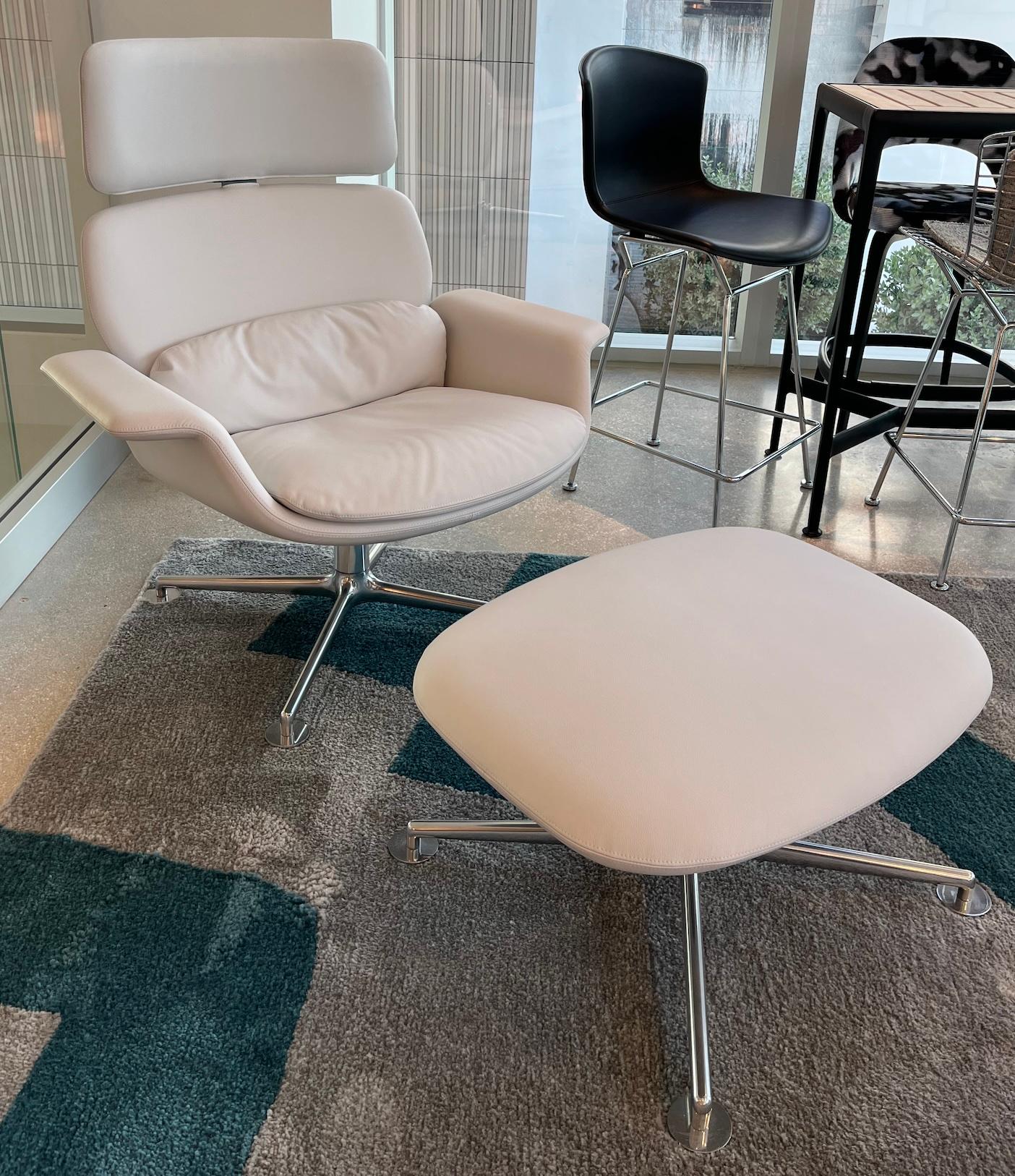 Designed by renowned Italian architect Piero Lissoni for Knoll, the KN High Back Swivel Reclining Lounge Chair and Ottoman Set blends sophisticated comfort with sculptural modernism. Part of the KN Collection (KN02 chair and KN03 ottoman), this