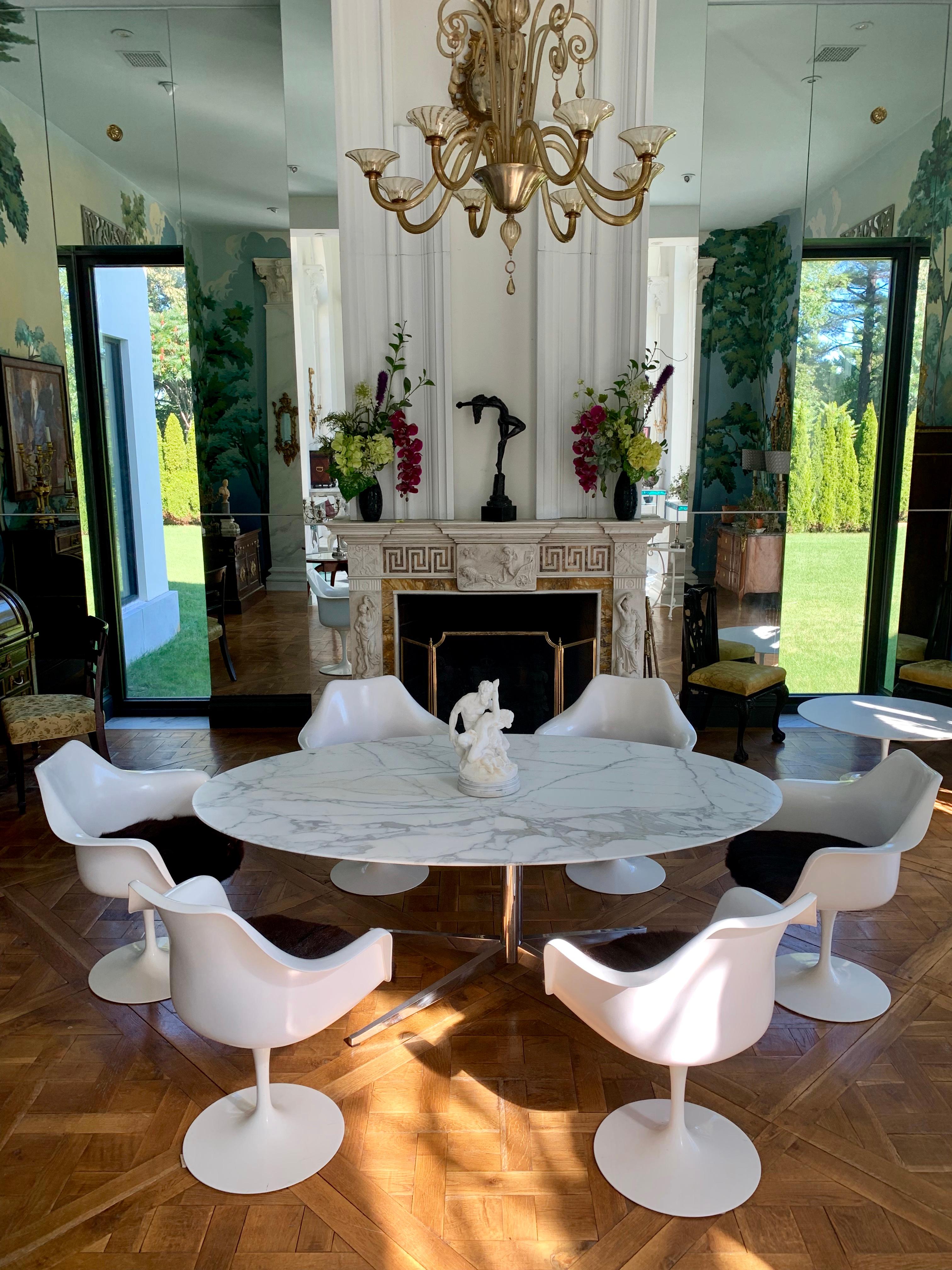 This sophisticated Knoll Calacatta marble top dining table has a beveled edge and 4 chrome-plated legs, circa 1965.