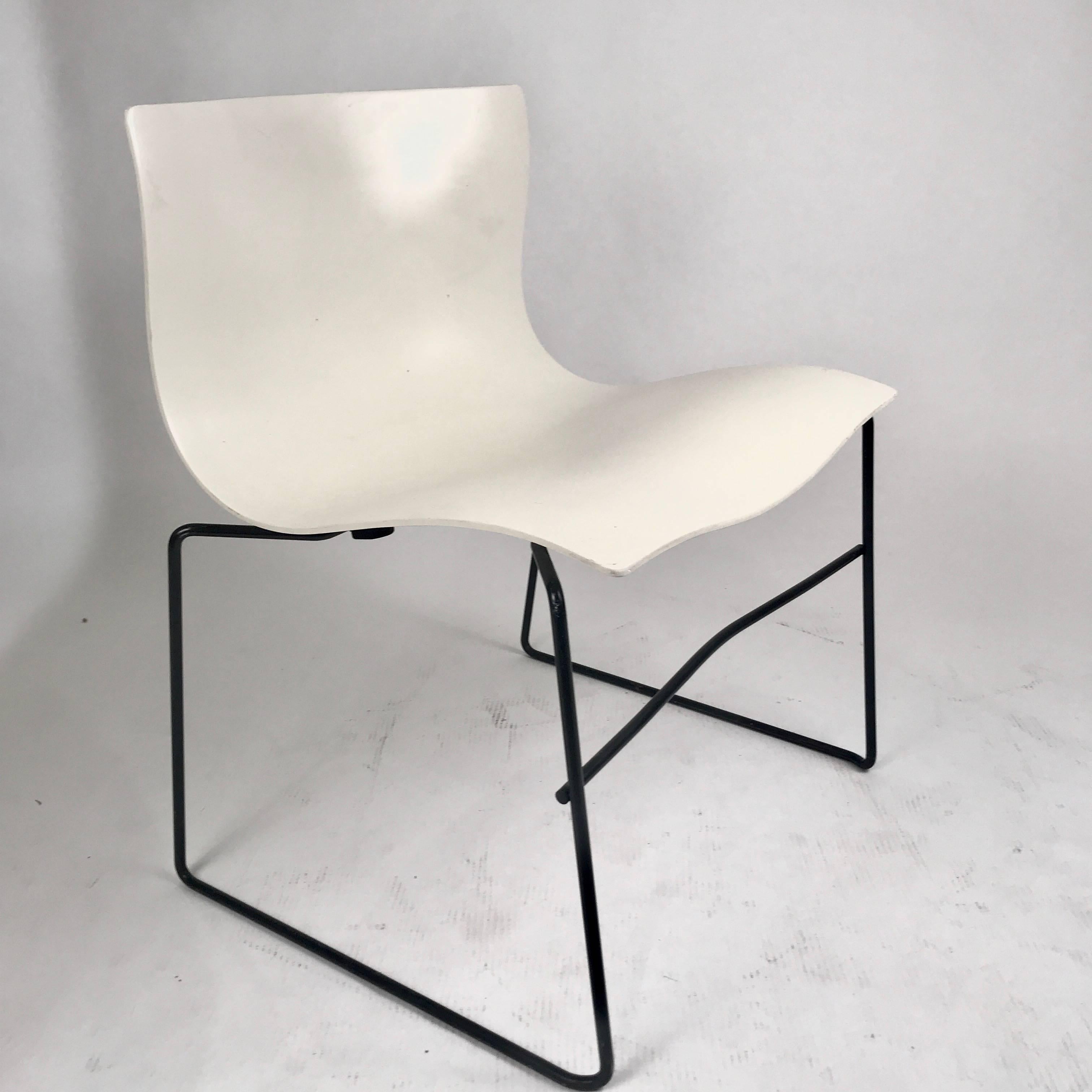 45 available stacking indoors /outdoors Knoll Vignelli handkerchief chairs in white with black wrought iron frame. Intended to evoke the windblown contours of a handkerchief blowing through the air, the generously scaled chair is practical and