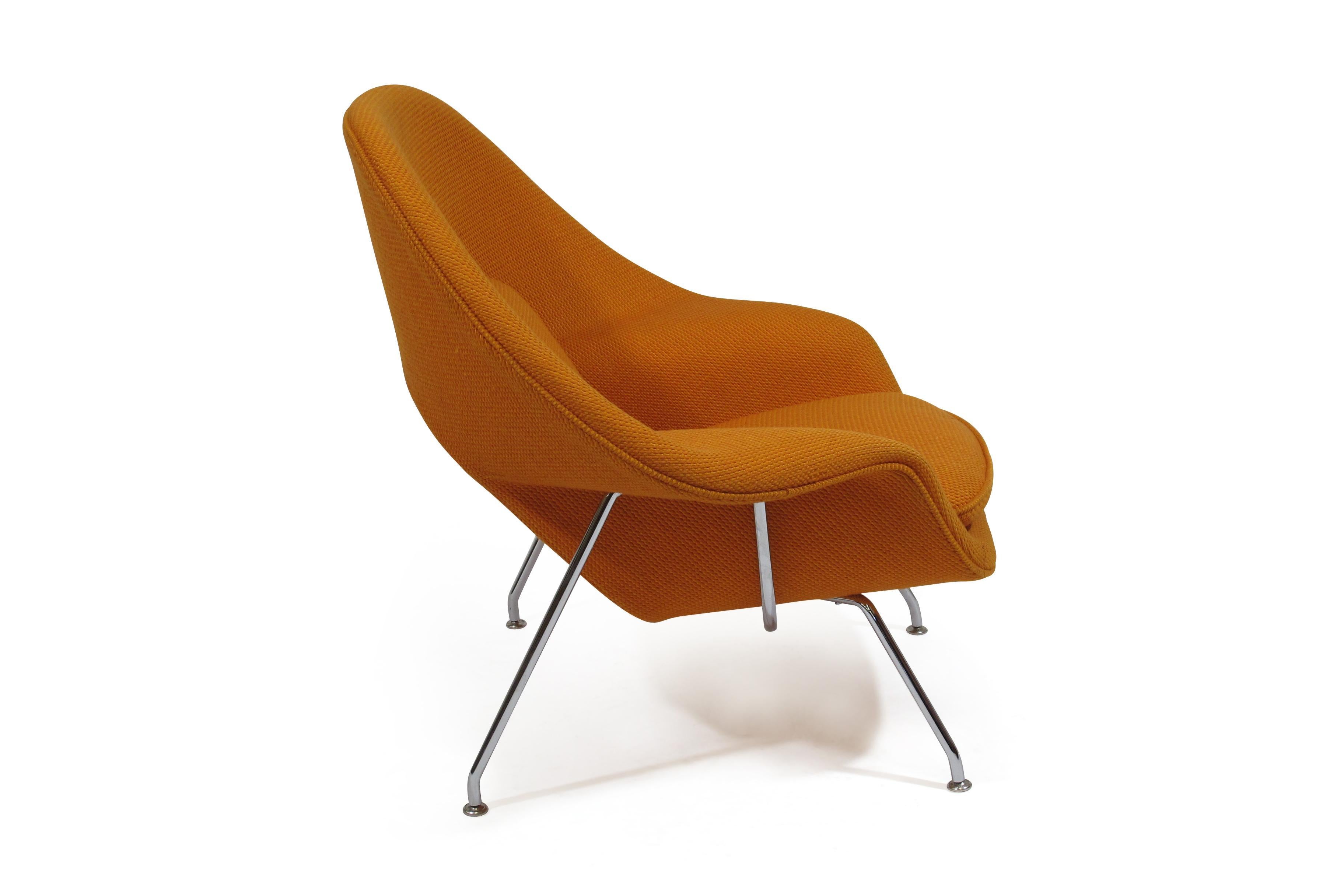 Eero Saarinen for Knoll Medium Womb chair foam covered molded fiberglass upholstered in Knoll CATO orange wool on polished chrome legs.